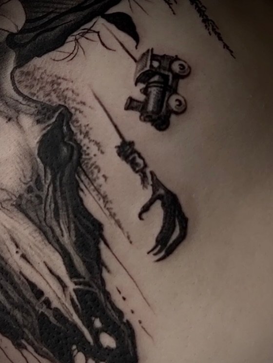 Robotic arm black and grey tattoo by Tattoo Artist Mimzi PMA