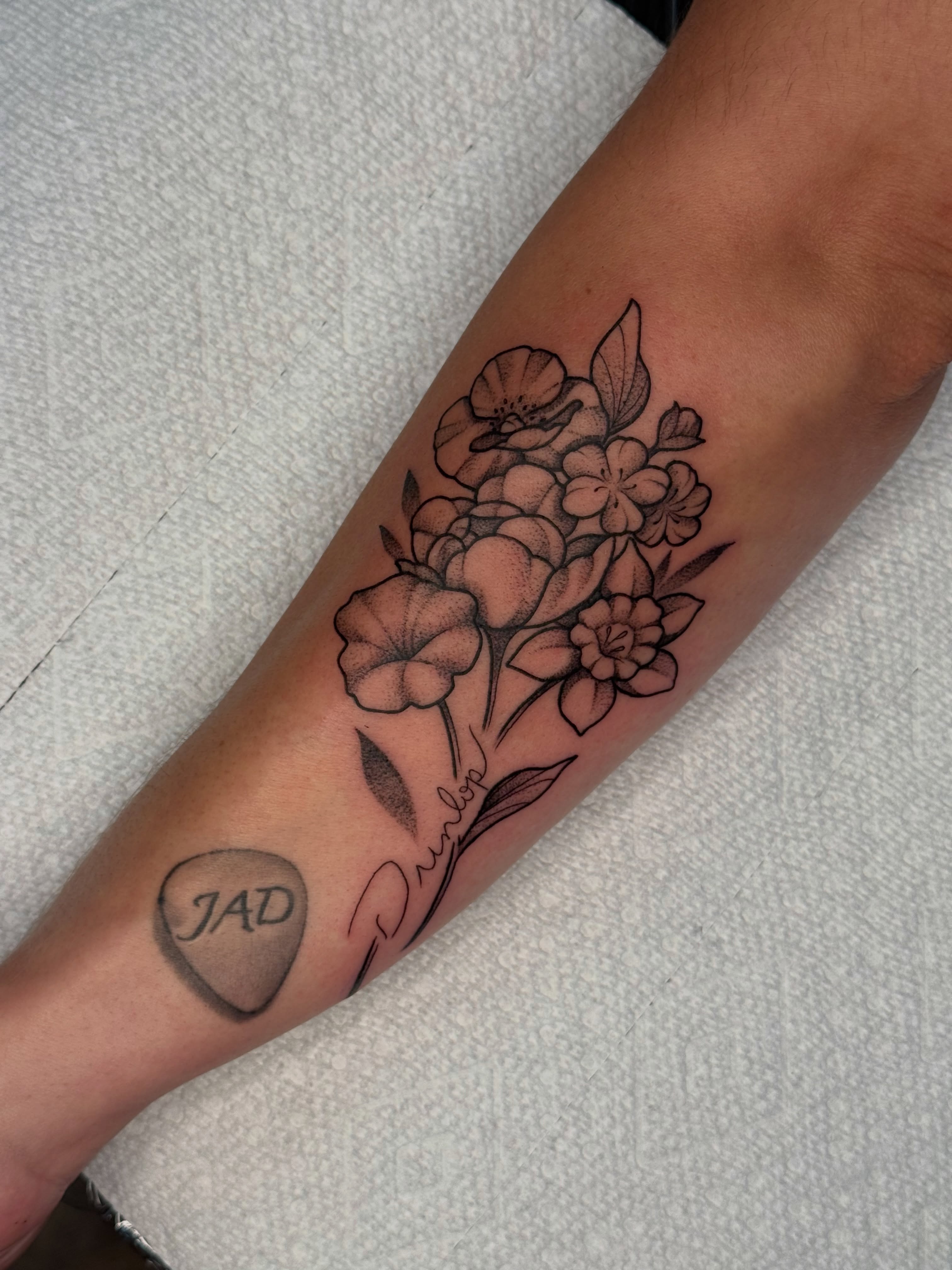 Flower bouquet dotwork tattoo on the forearm by Emma Friesen - Lancaster & York Tattoo Artist, Lancaster, Pennsylvania