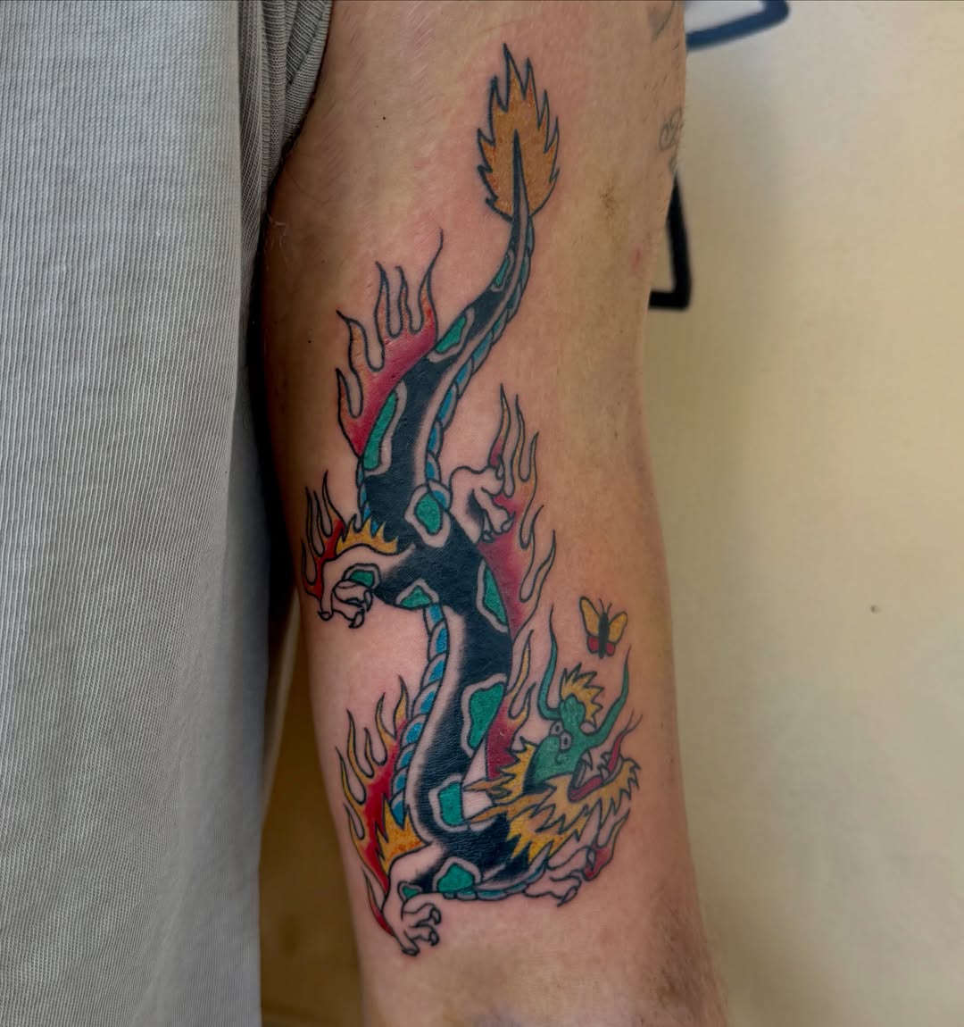 Dragon American traditional tattoo on the forearm by savannah
