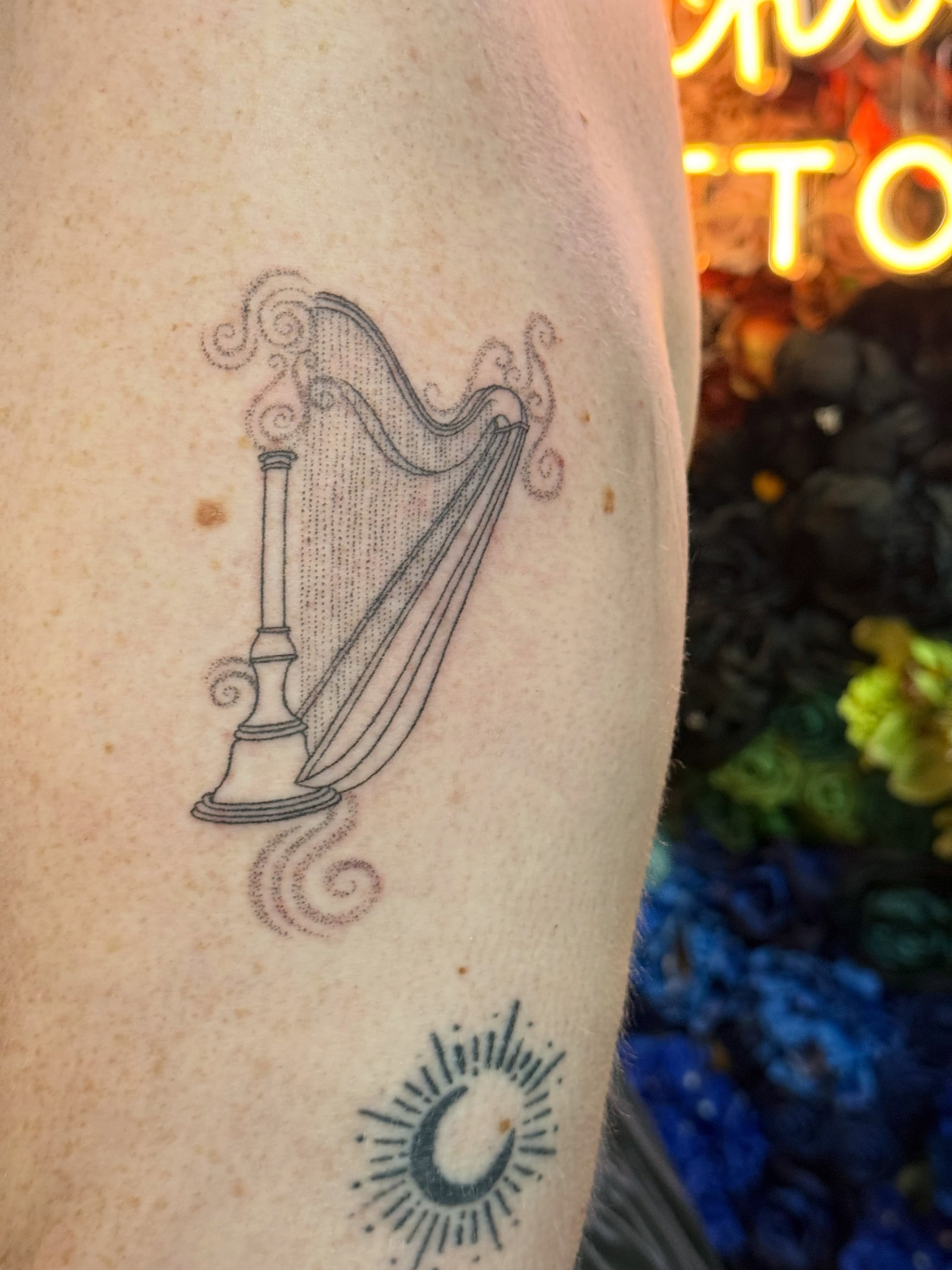 Harp dotwork tattoo on the forearm by Handpoke Tattoo Artist, Minneapolis, Minnesota