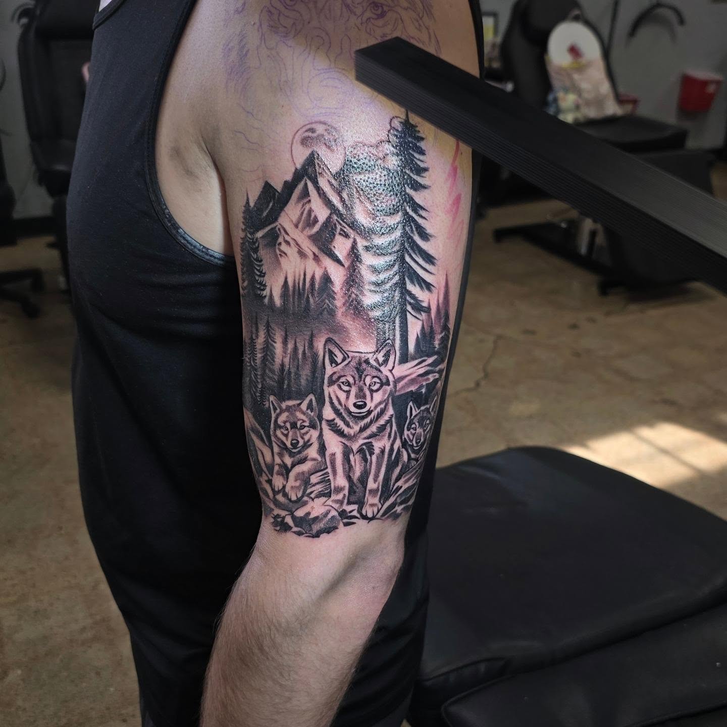 Wolf family dotwork tattoo on the forearm by Tattoo Seez, Wichita, Kansas