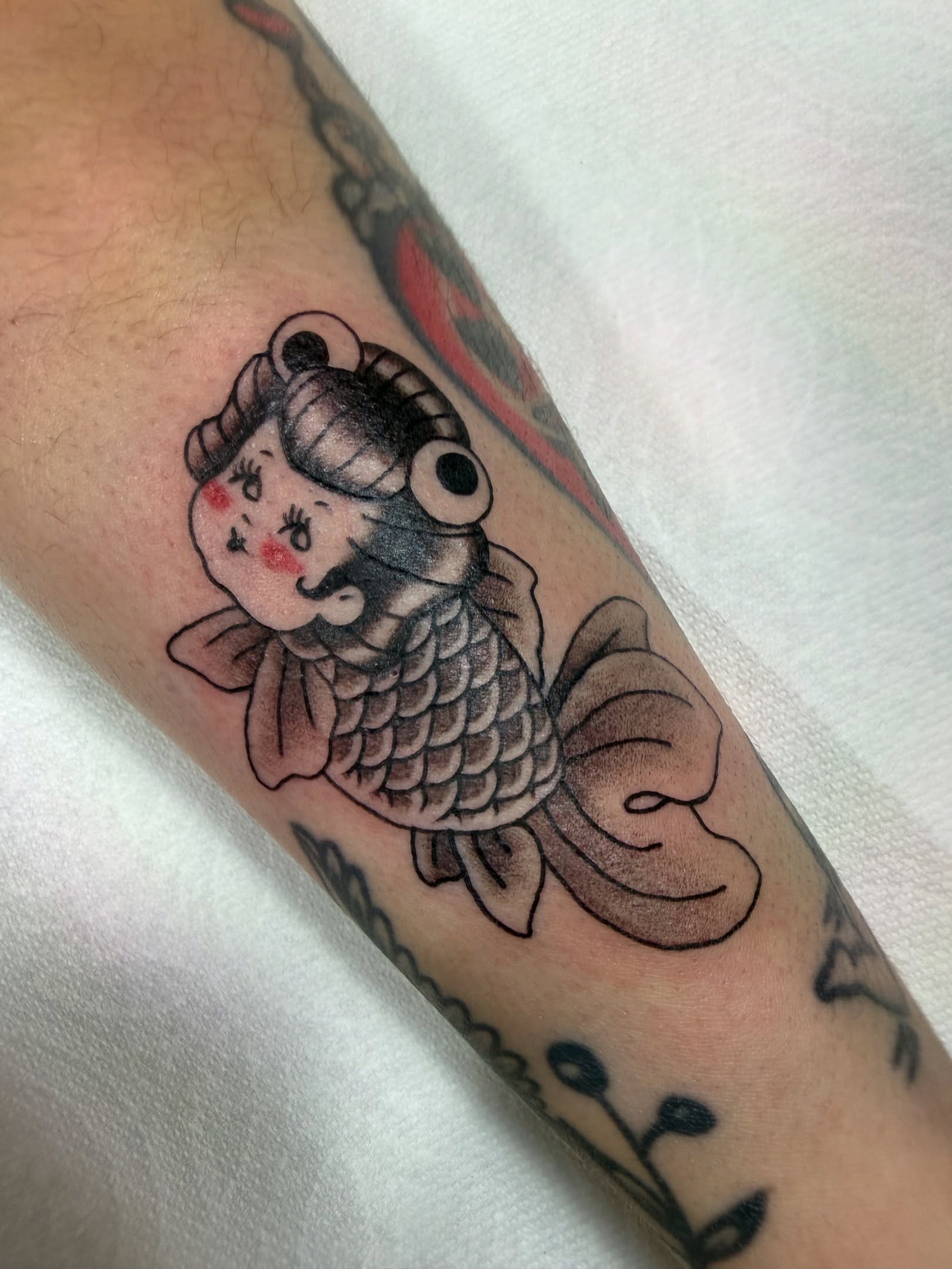 Koi fish American traditional tattoo on the forearm by Las Vegas Tattoo Artist π€ Nani