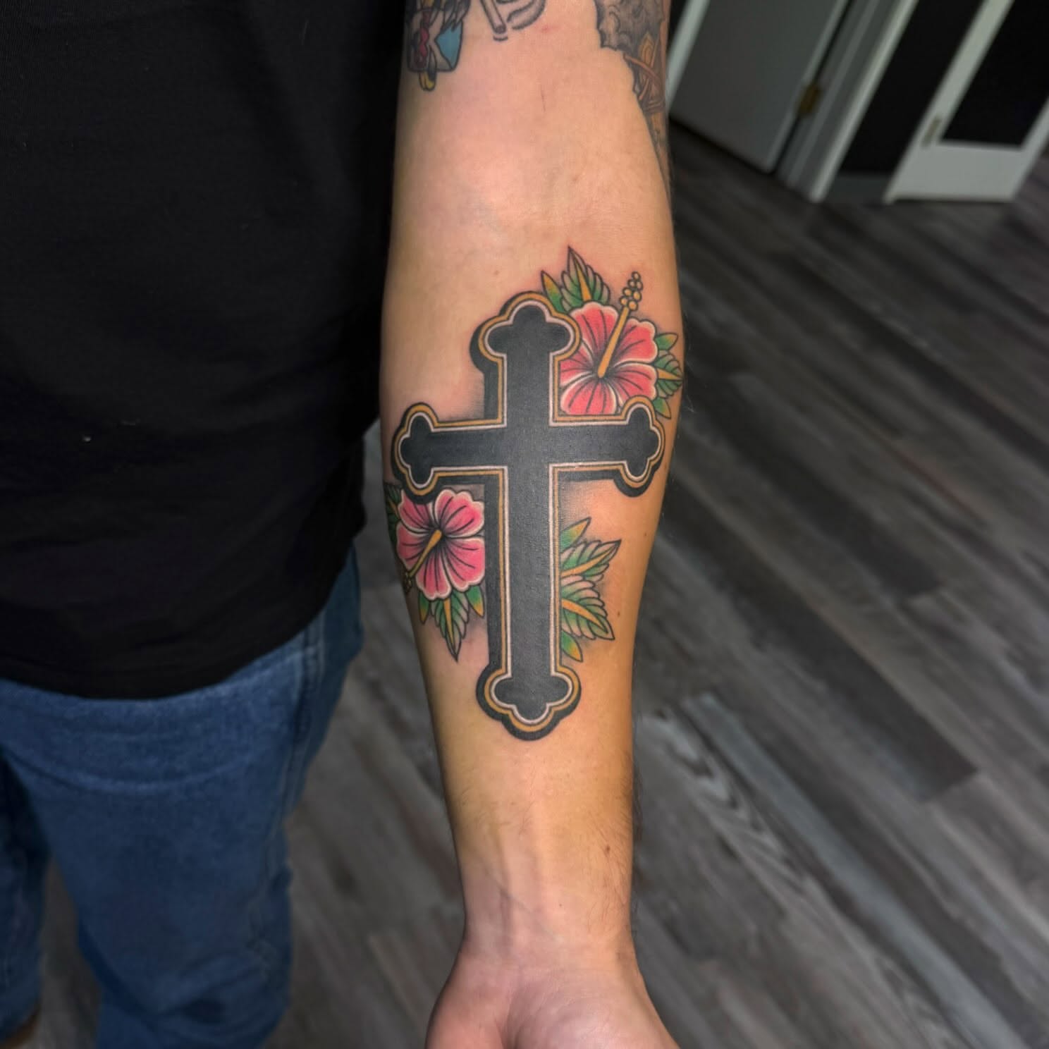Cross with flowers American traditional tattoo on the forearm by ✶ teryn ✶, Akron, Ohio