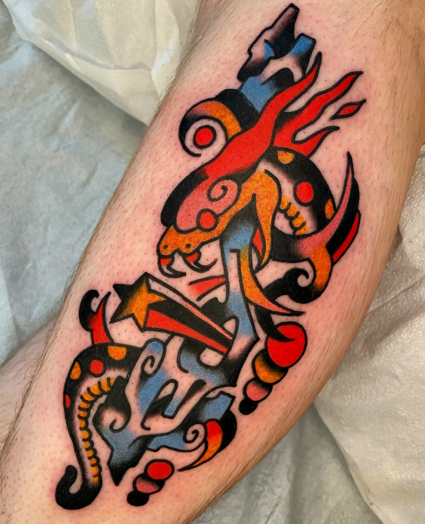 Astronaut American traditional tattoo on the forearm by Quinn, Kansas City, Missouri