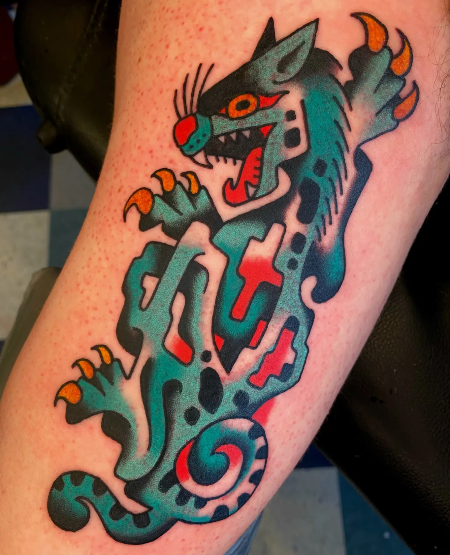 Monster American traditional tattoo on the forearm by Quinn, Kansas City, Missouri