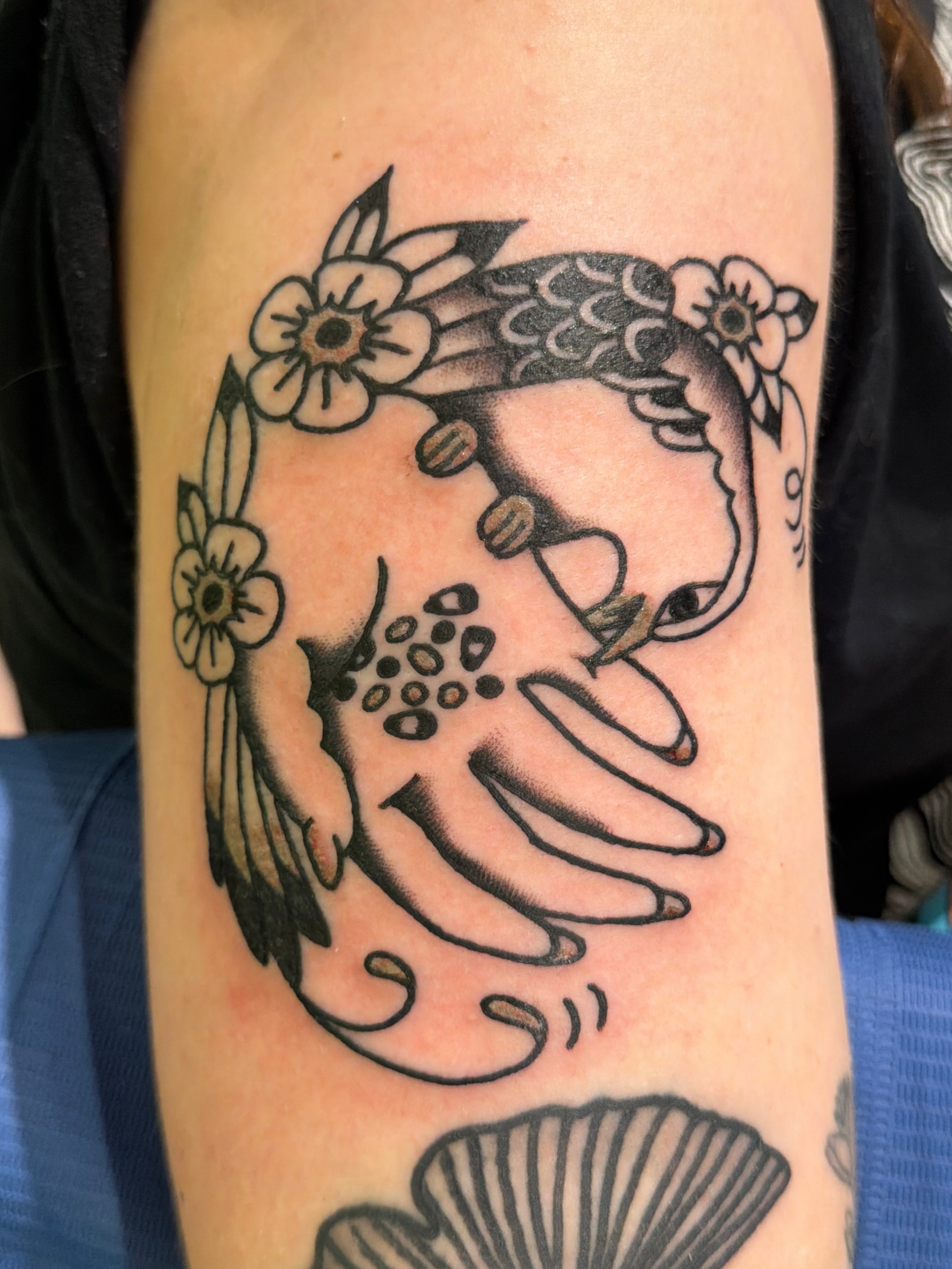 Octopus black and grey tattoo on the forearm by Emma Fox Tattoo