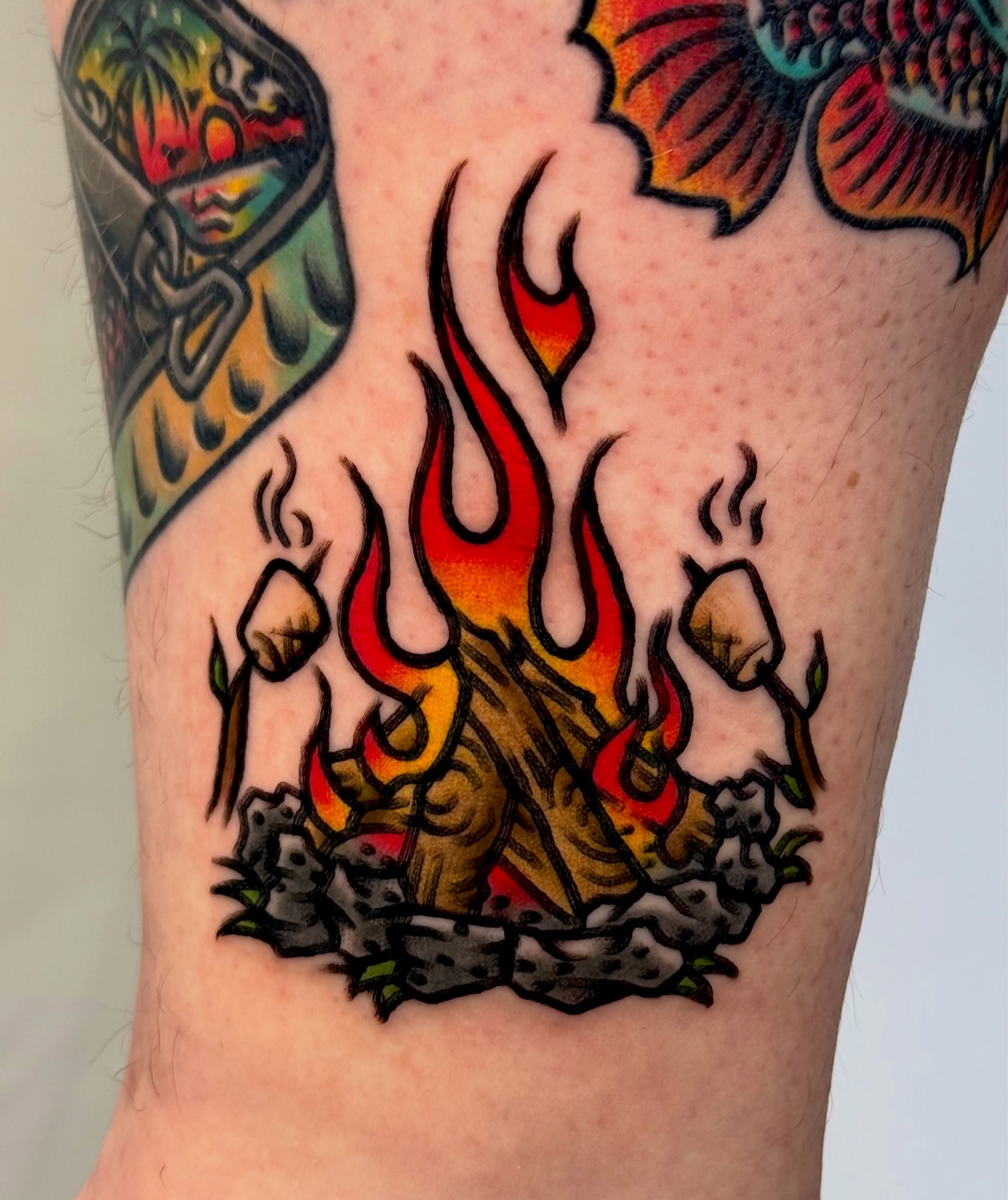 Campfire and marshmallows American traditional tattoo on the forearm by Tattooer Sancho 🇰🇷🇨🇦