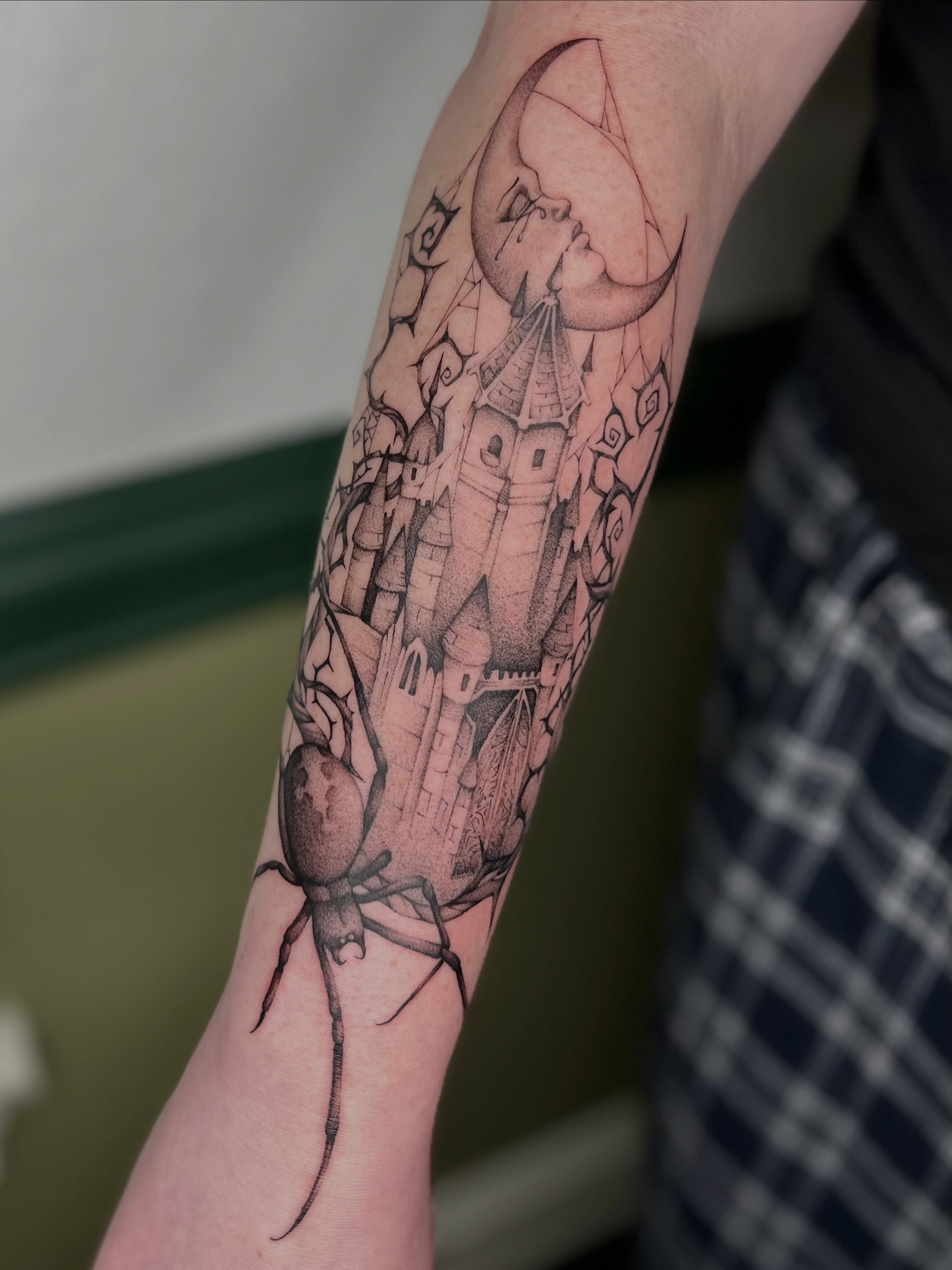 Castle and spider realism tattoo on the forearm by Ash F
