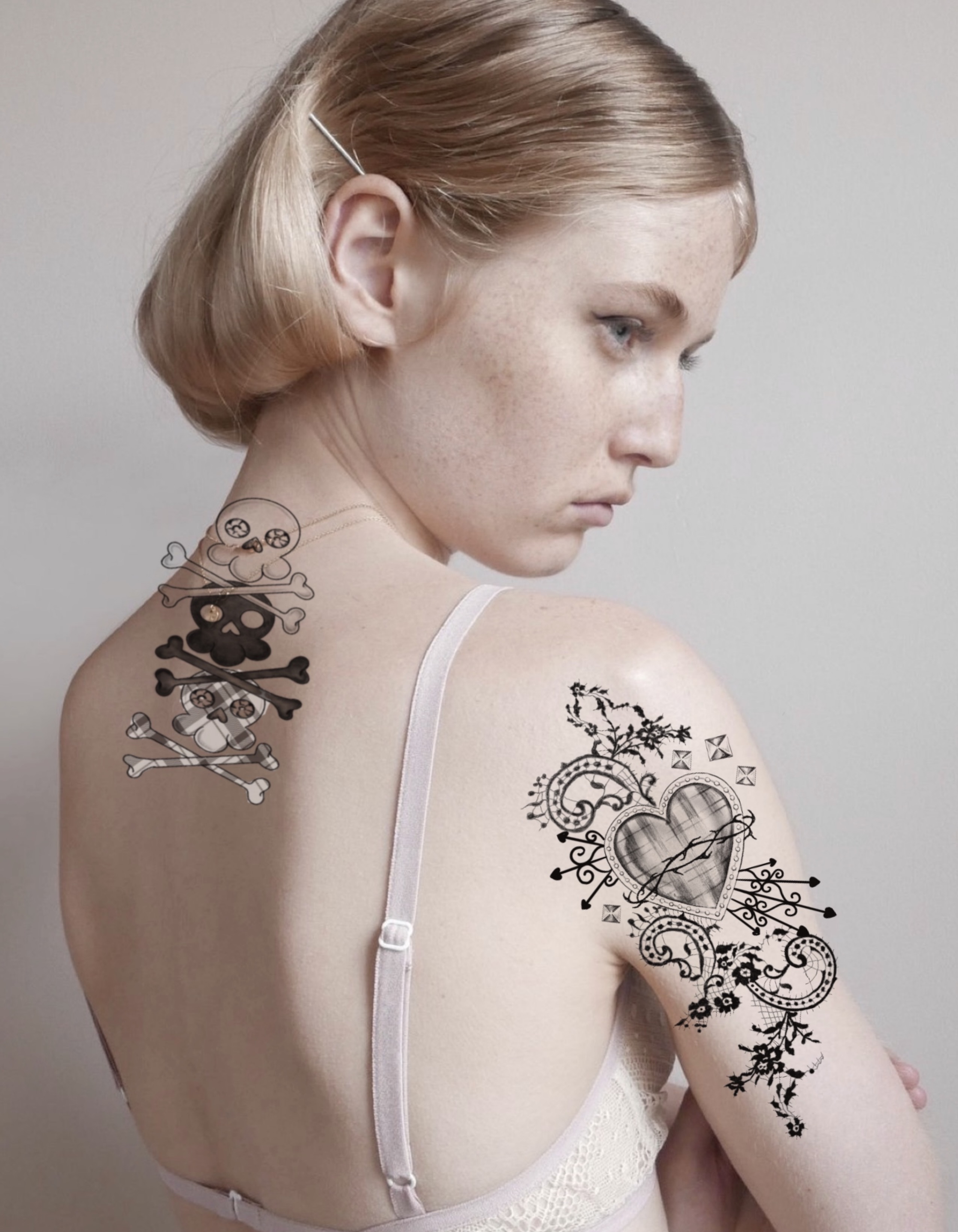 Skulls and crossbones black and grey tattoo on the back by Maddie Blosser, Portland, Oregon