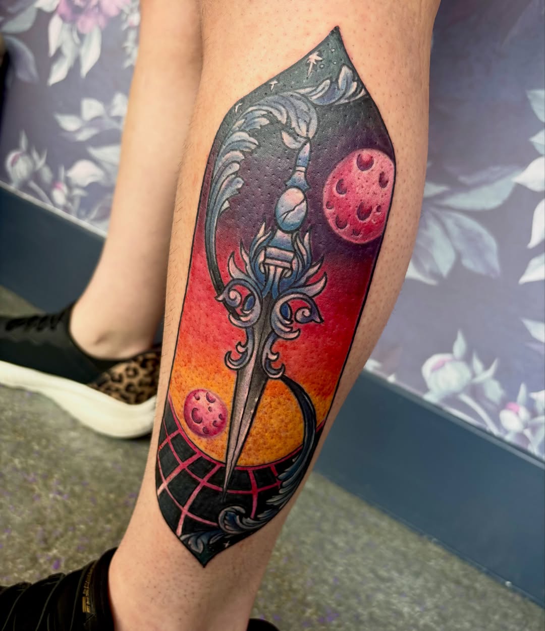 Space-themed fantasy surrealism tattoo on the forearm by Bre Alex