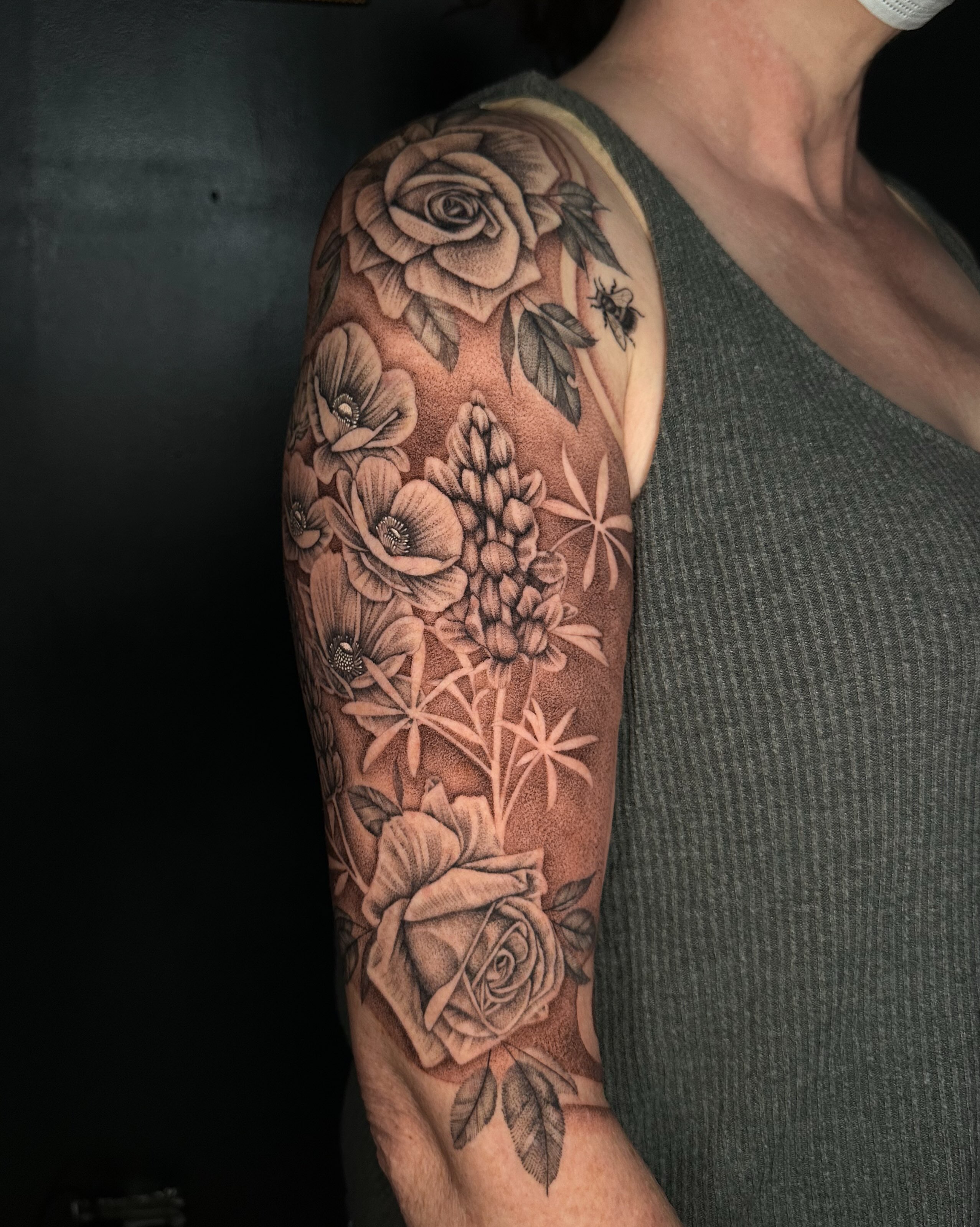 Floral bouquet realism tattoo on the forearm by Jhonny David lay