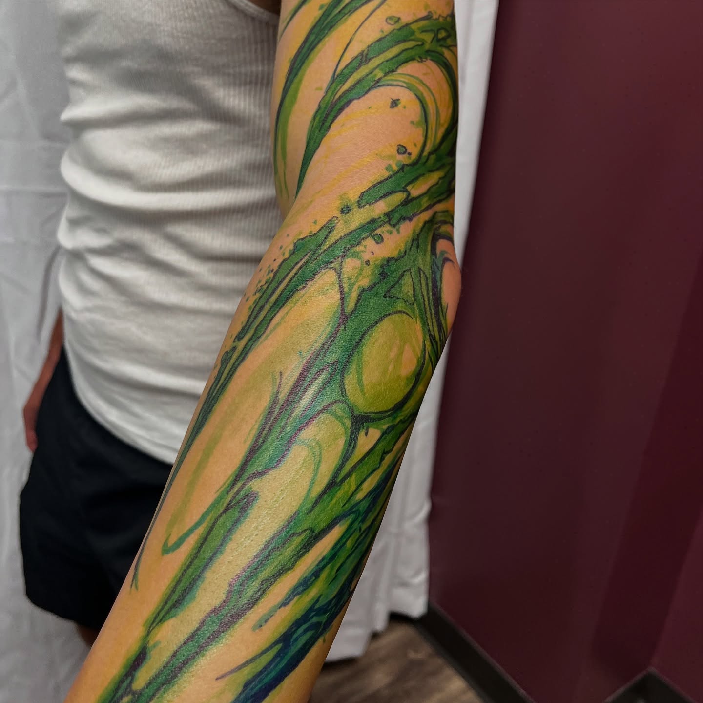Abstract swirls new school tattoo on the forearm by Cameron Jenkins