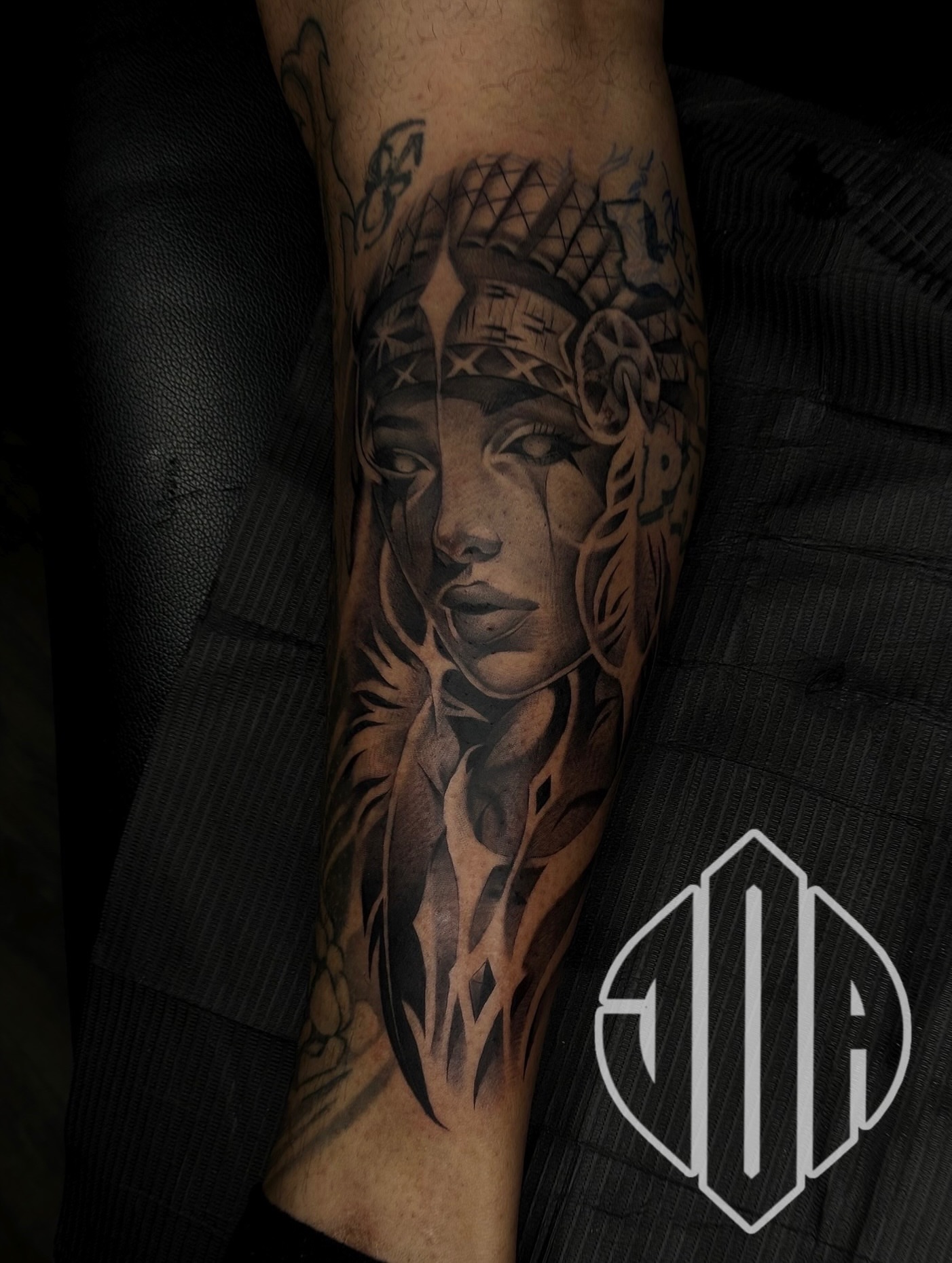 Woman's face realism tattoo on the forearm by Jay Daartist