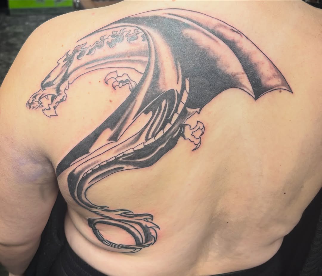 Dragon black and grey tattoo on the back by Jeff Zuptich