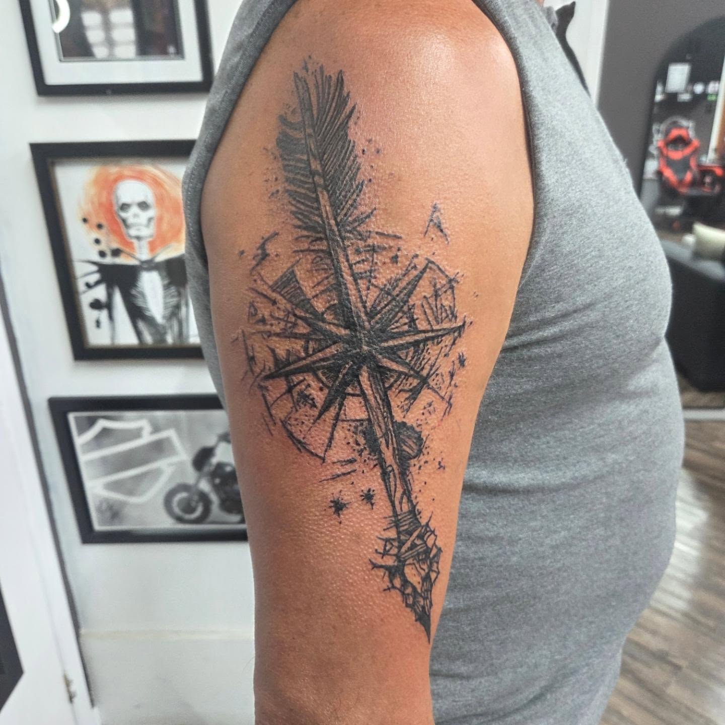 Compass black and grey tattoo on the shoulder by Matthew Todd Kremer