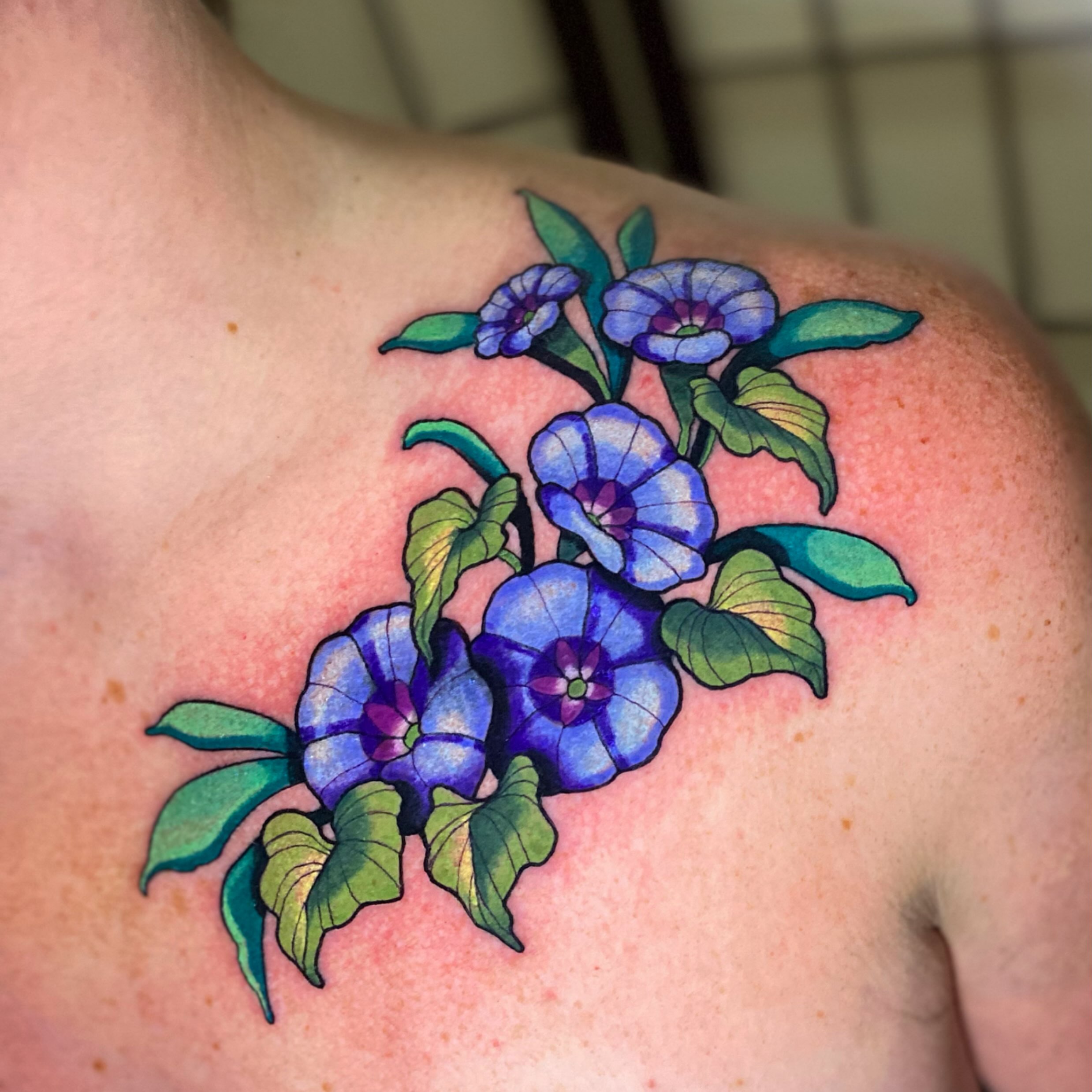 Morning glory flowers new school tattoo on the shoulder by Lindsay Hall