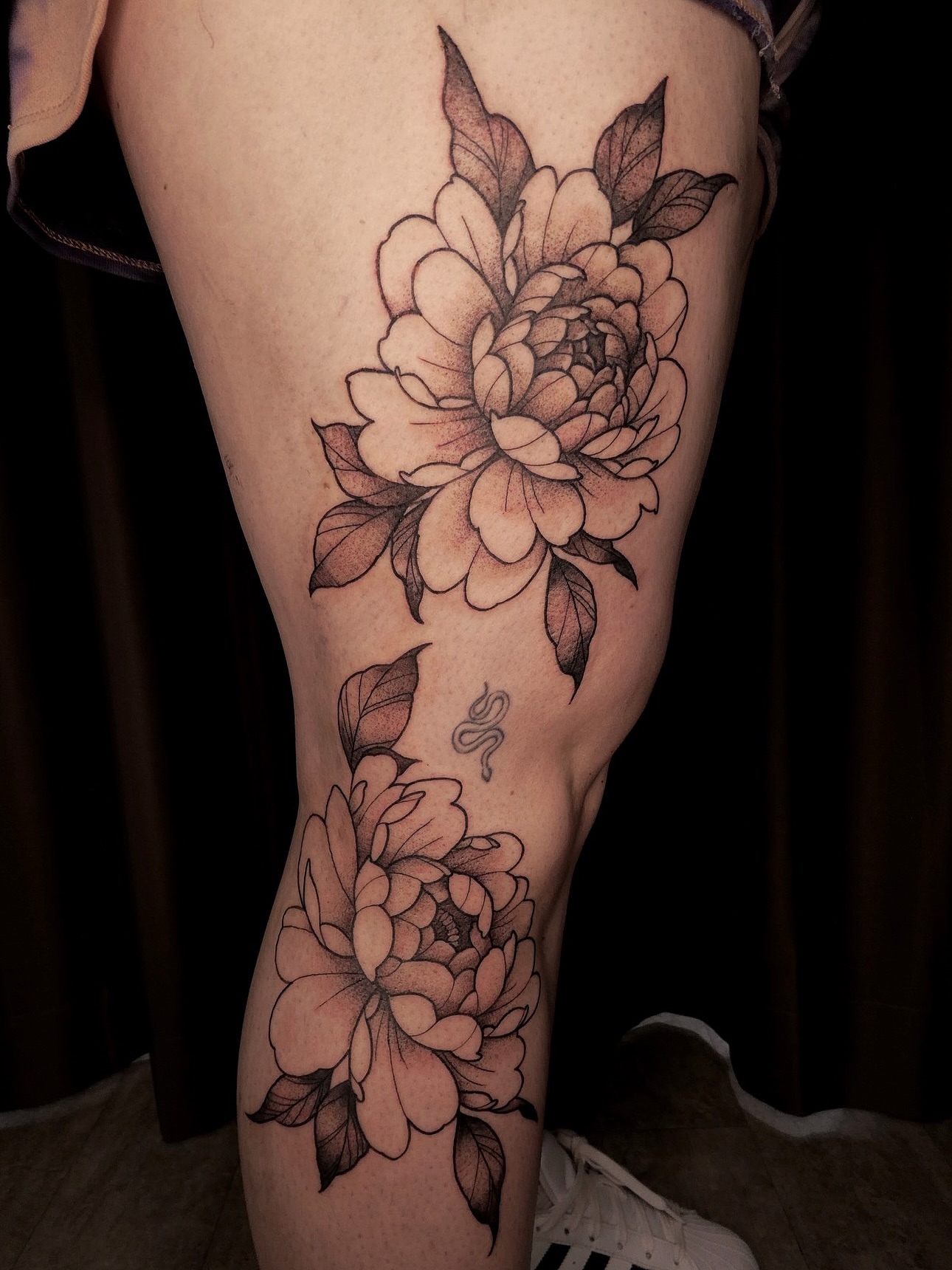 Peony flowers black and grey tattoo on the thigh by ✧˖°. Jordan