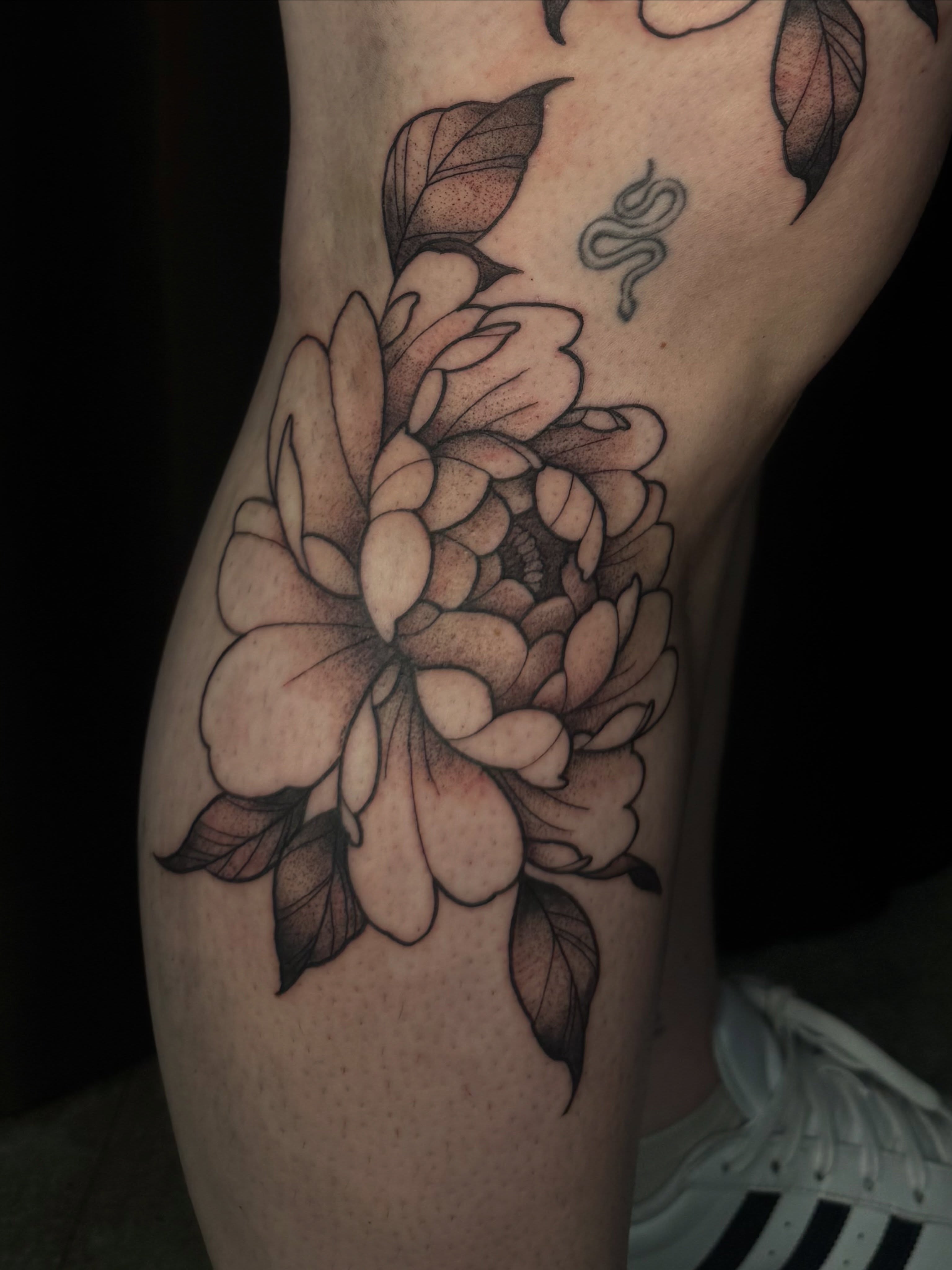 Peony black and grey tattoo on the thigh by ✧˖°. Jordan
