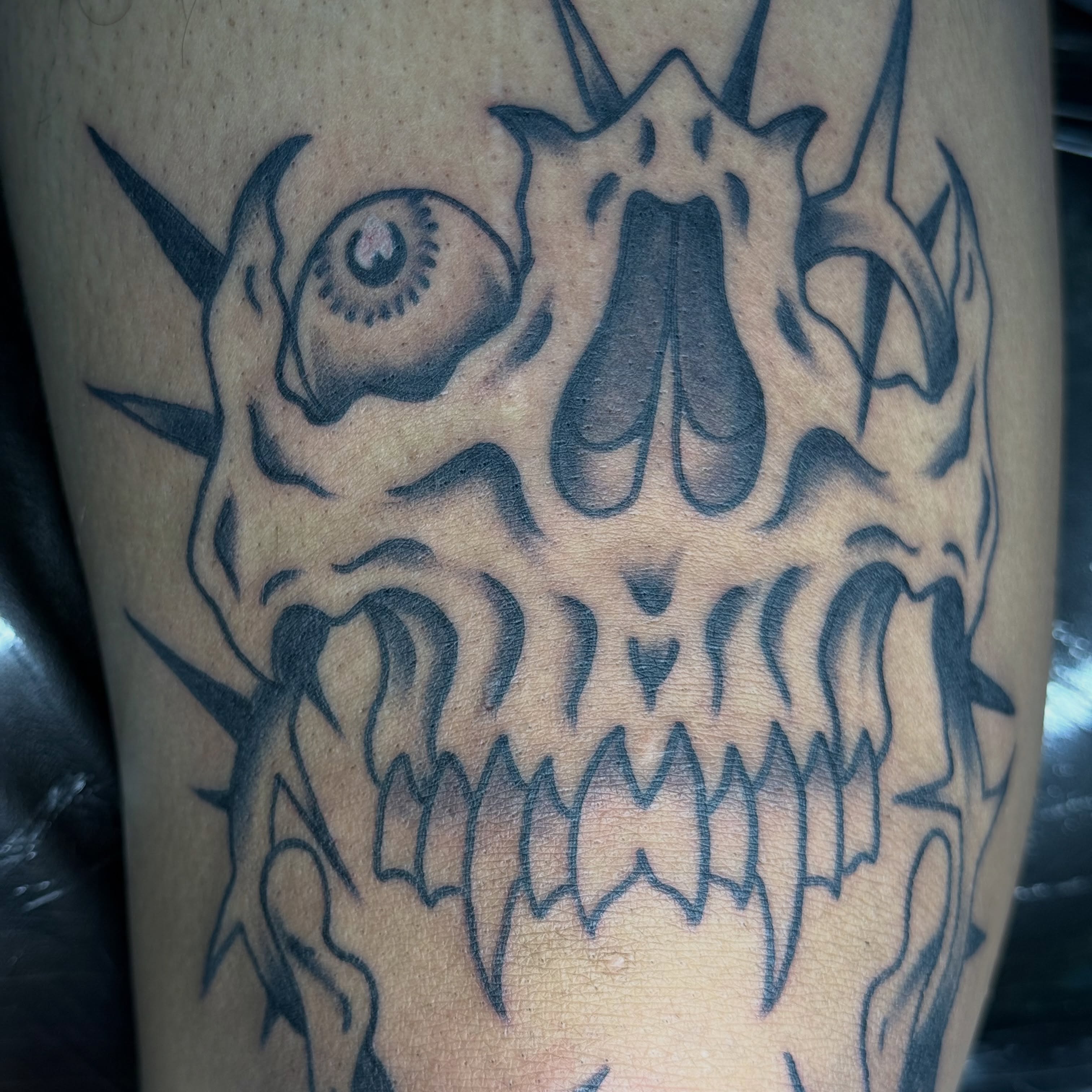 Skull black and grey tattoo on the forearm by Kaysen
