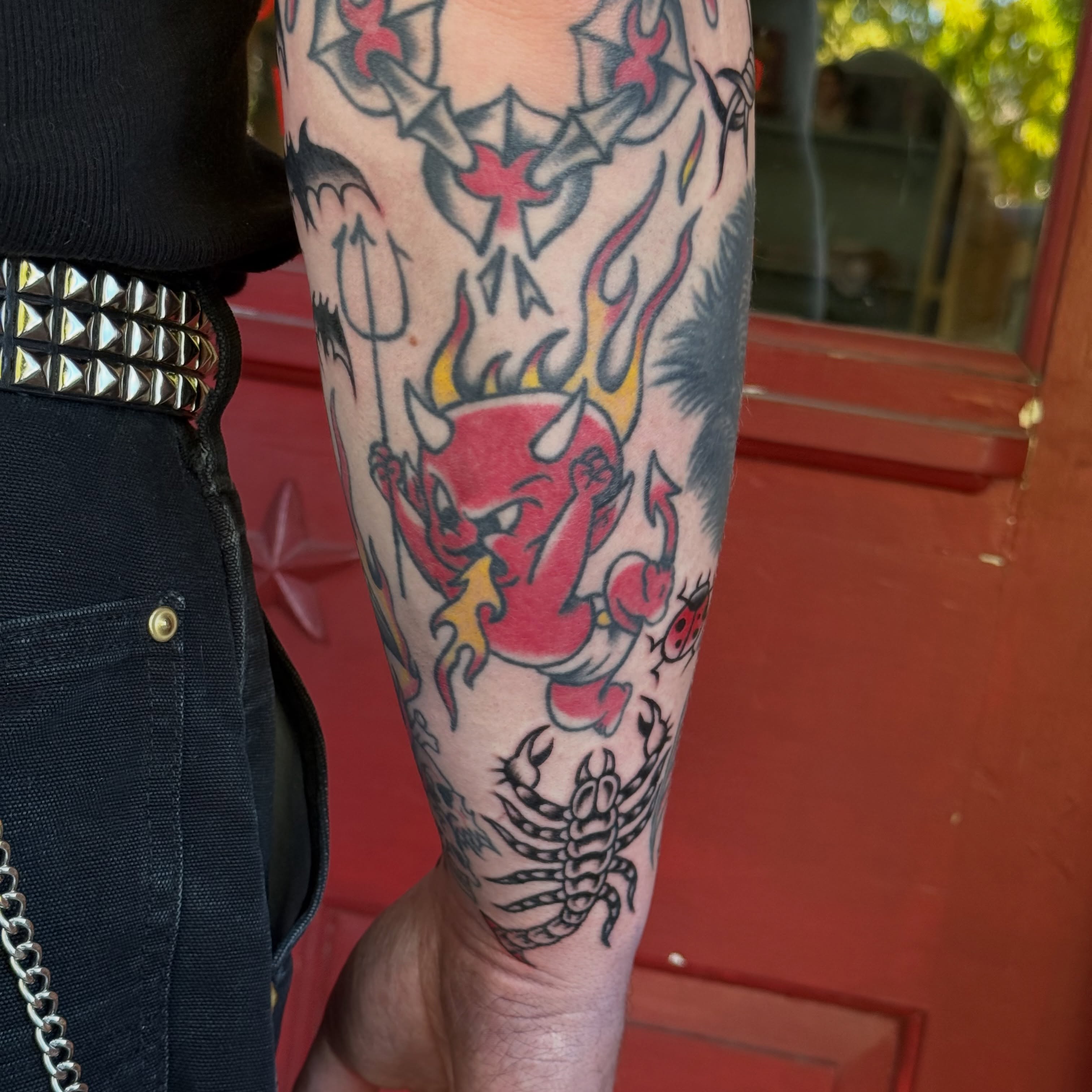 Red devil American traditional tattoo on the forearm by Kaysen