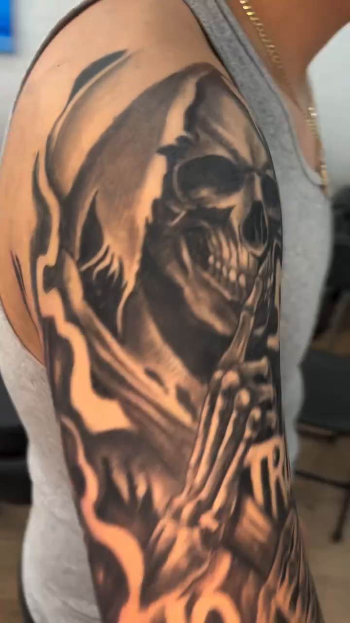 Tattoo by @teeski_ink — black_and_grey, realism