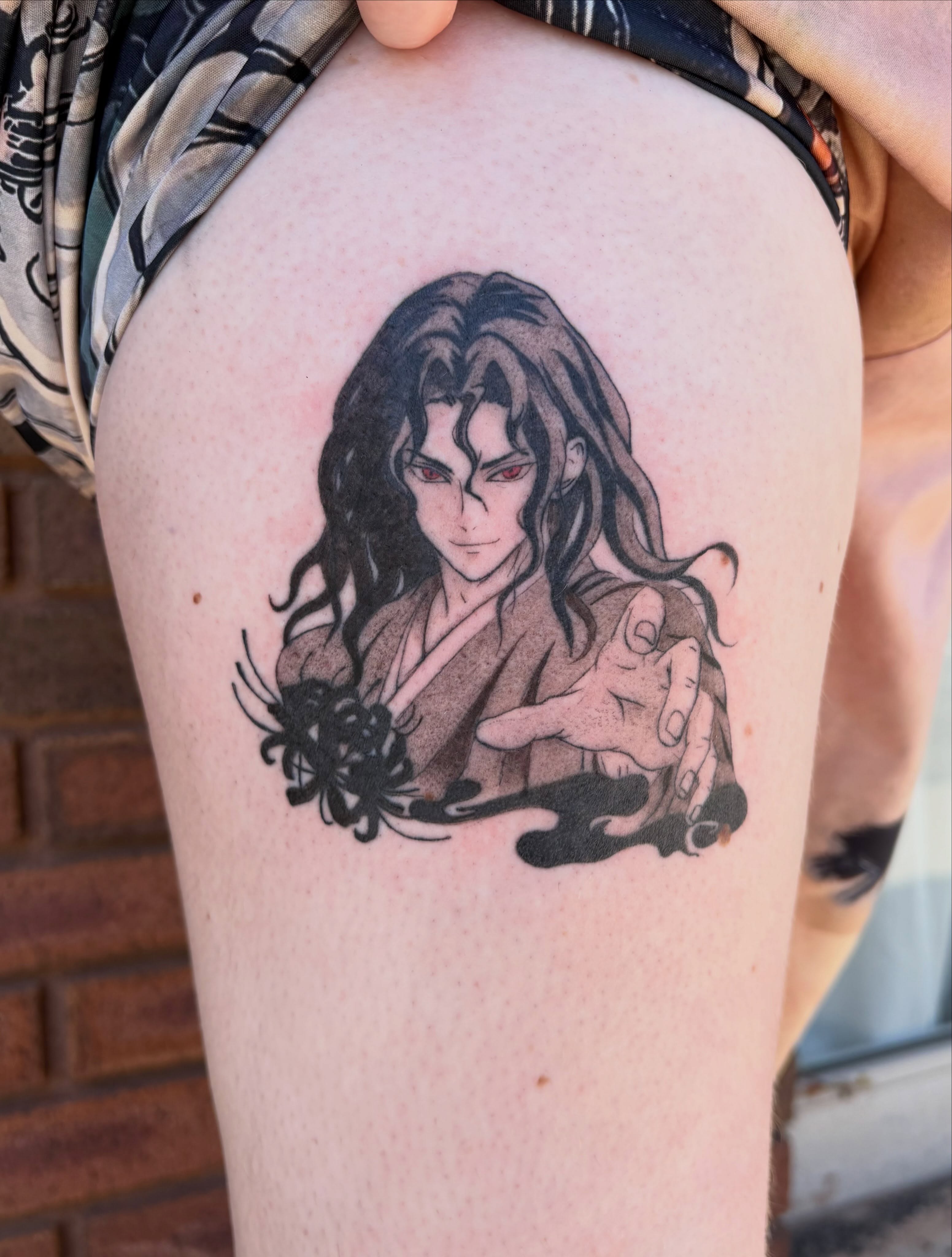 Anime character anime tattoo on the thigh by Sierra Maynard