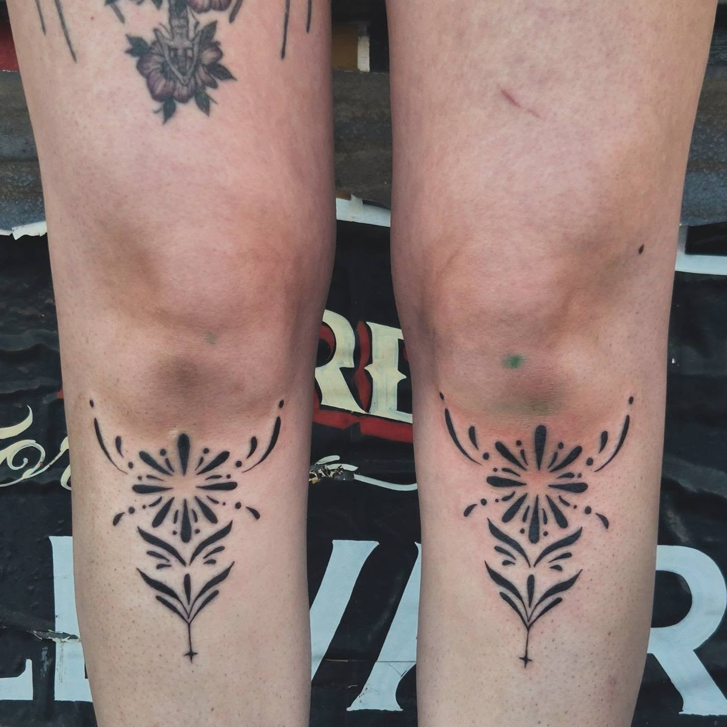 Floral design black and grey tattoo on the calf by Cielle