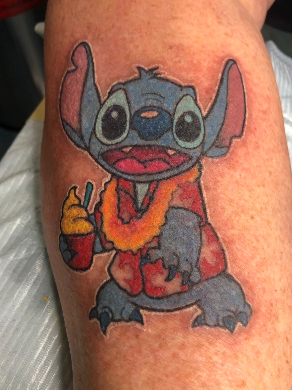 Stitch new school tattoo on the forearm by 🗿🌴TᗩᕼITI GIᒪ✨🏰