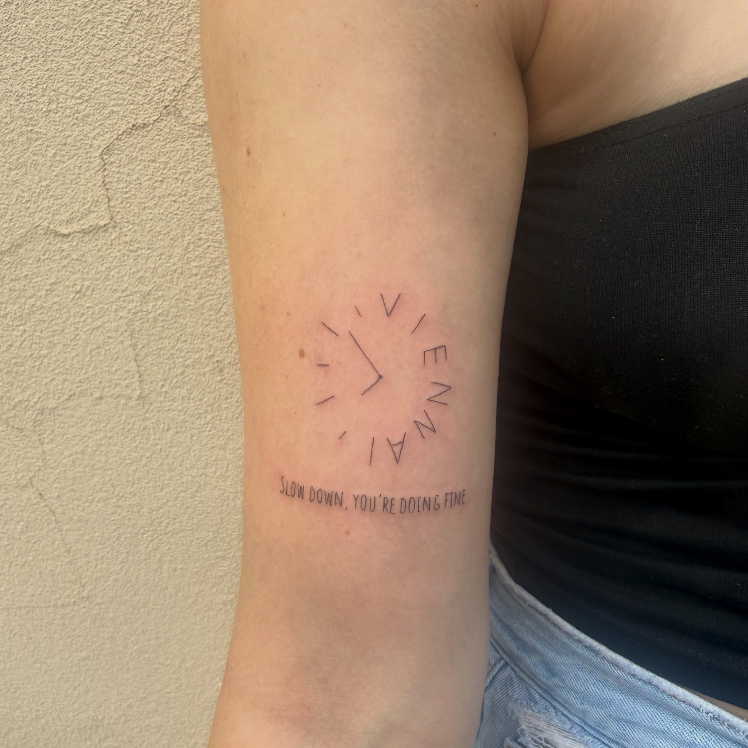 Clock geometric tattoo on the forearm by Kylee Snow