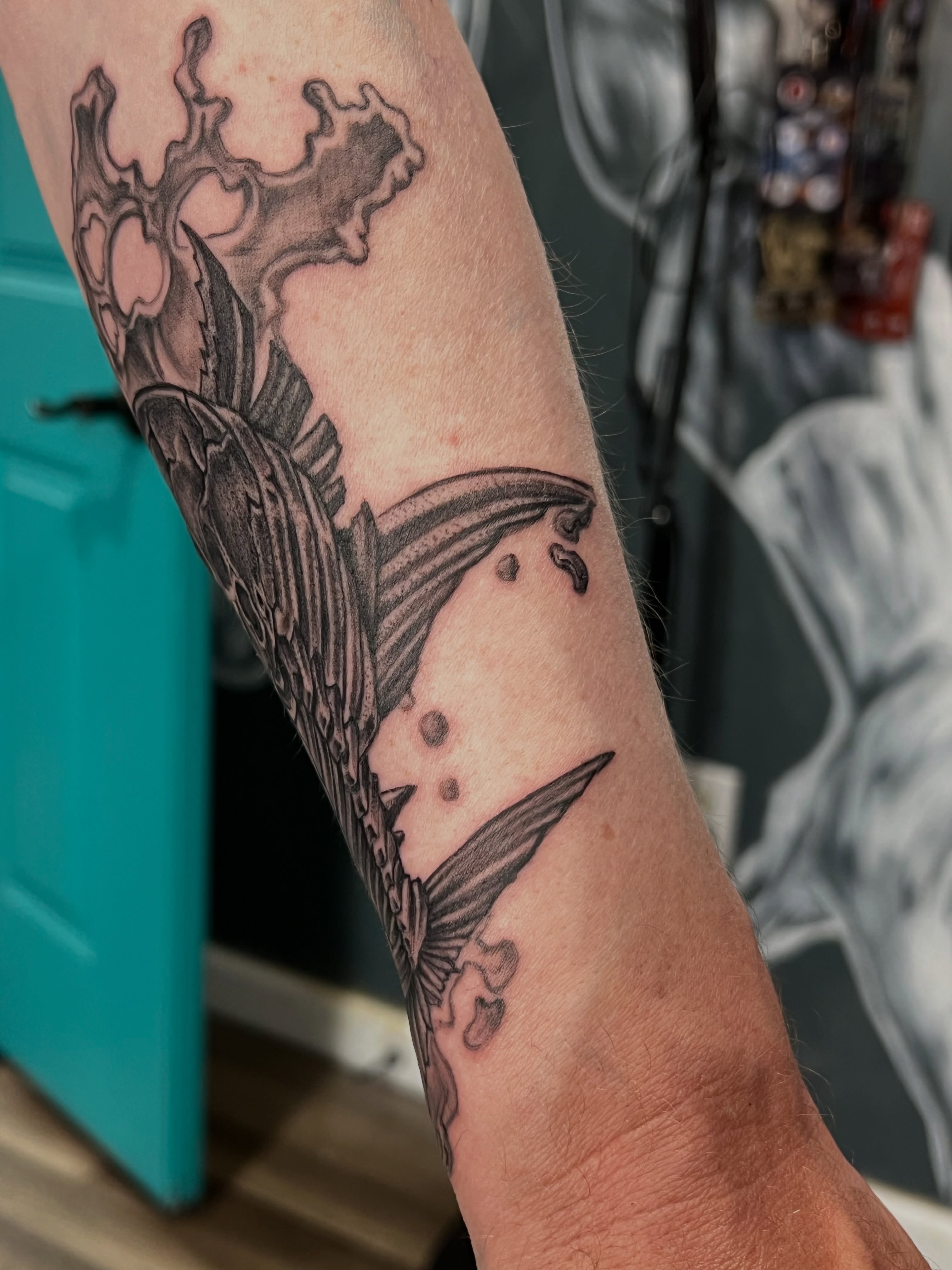 Mermaid black and grey tattoo on the forearm by Simón, Newington, Connecticut