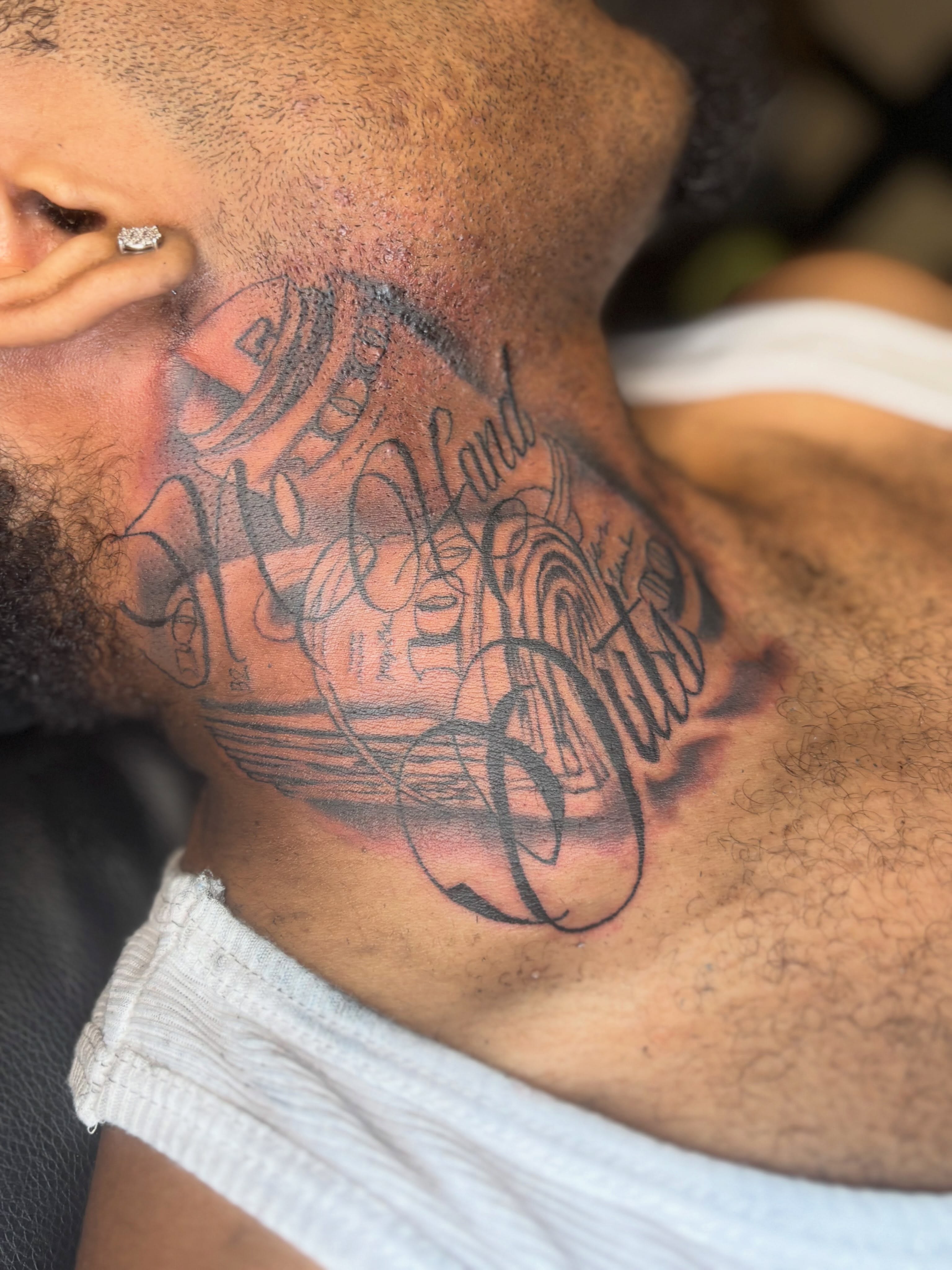 Engine black and grey tattoo on the neck by Mr.K