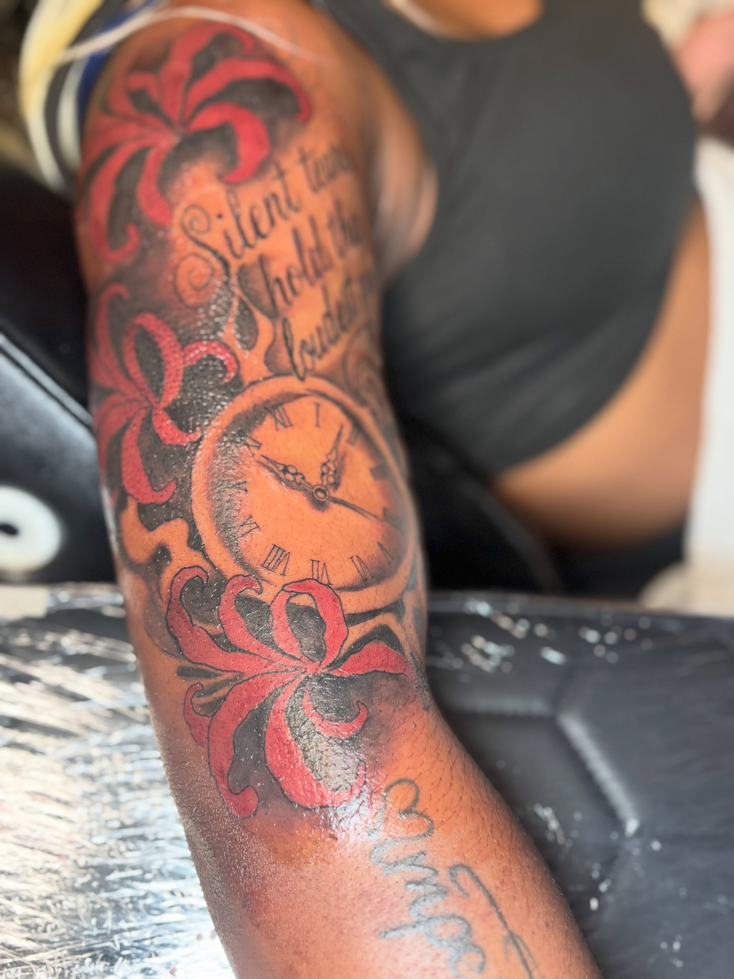 Clock and floral American traditional tattoo on the forearm by Mr.K