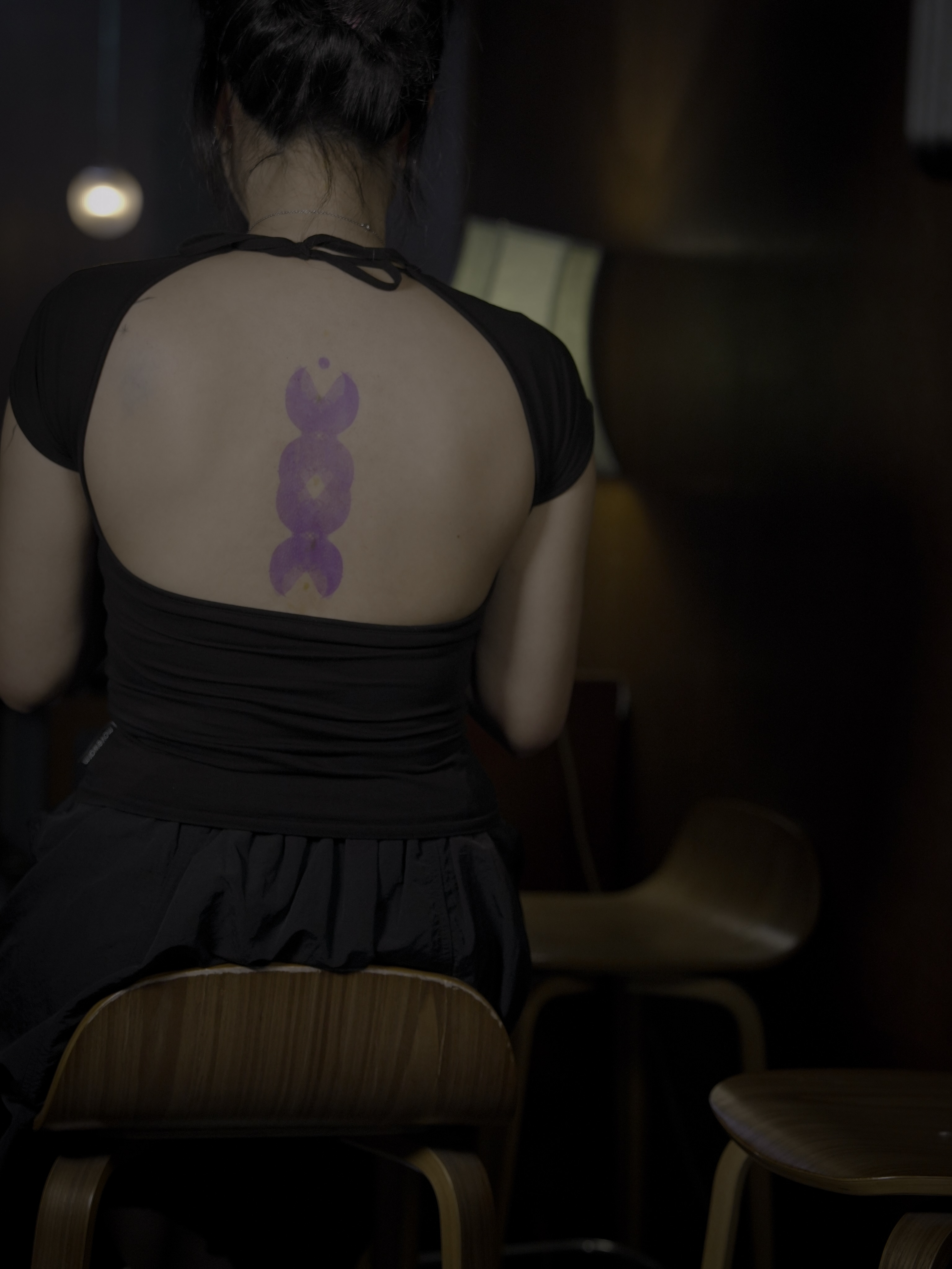 Purple abstract shape geometric tattoo on the back by Blight
