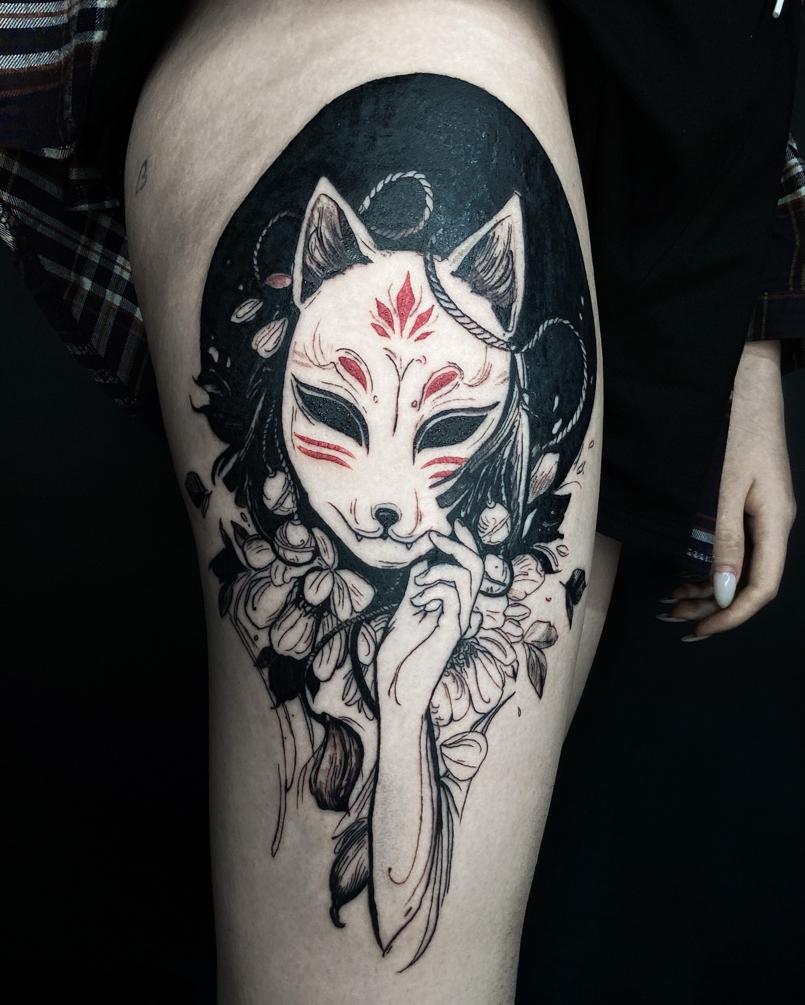 Fox mask dark realism tattoo on the thigh by Alexey Molyarenko