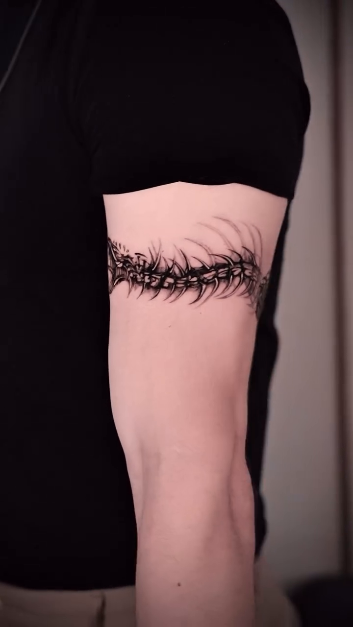 Tattoo by @dowoo_tattoo — blackwork, ornamental