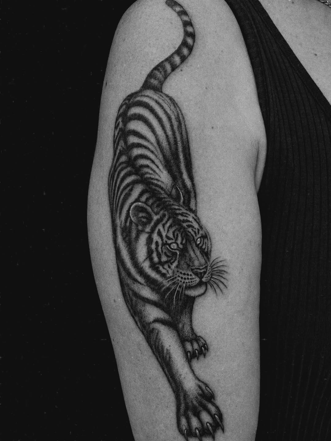 Tattoo by @amber_noir_tattoo — realism, black_and_grey