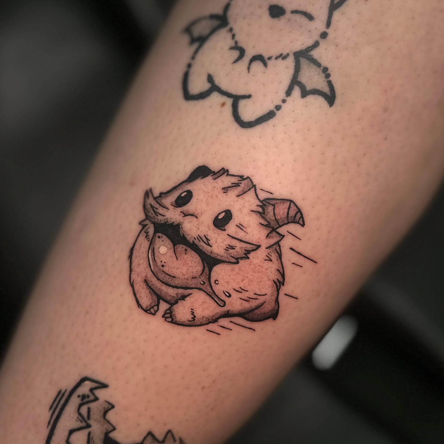 Chibi dragon dotwork tattoo on the forearm by Benjamin Frost