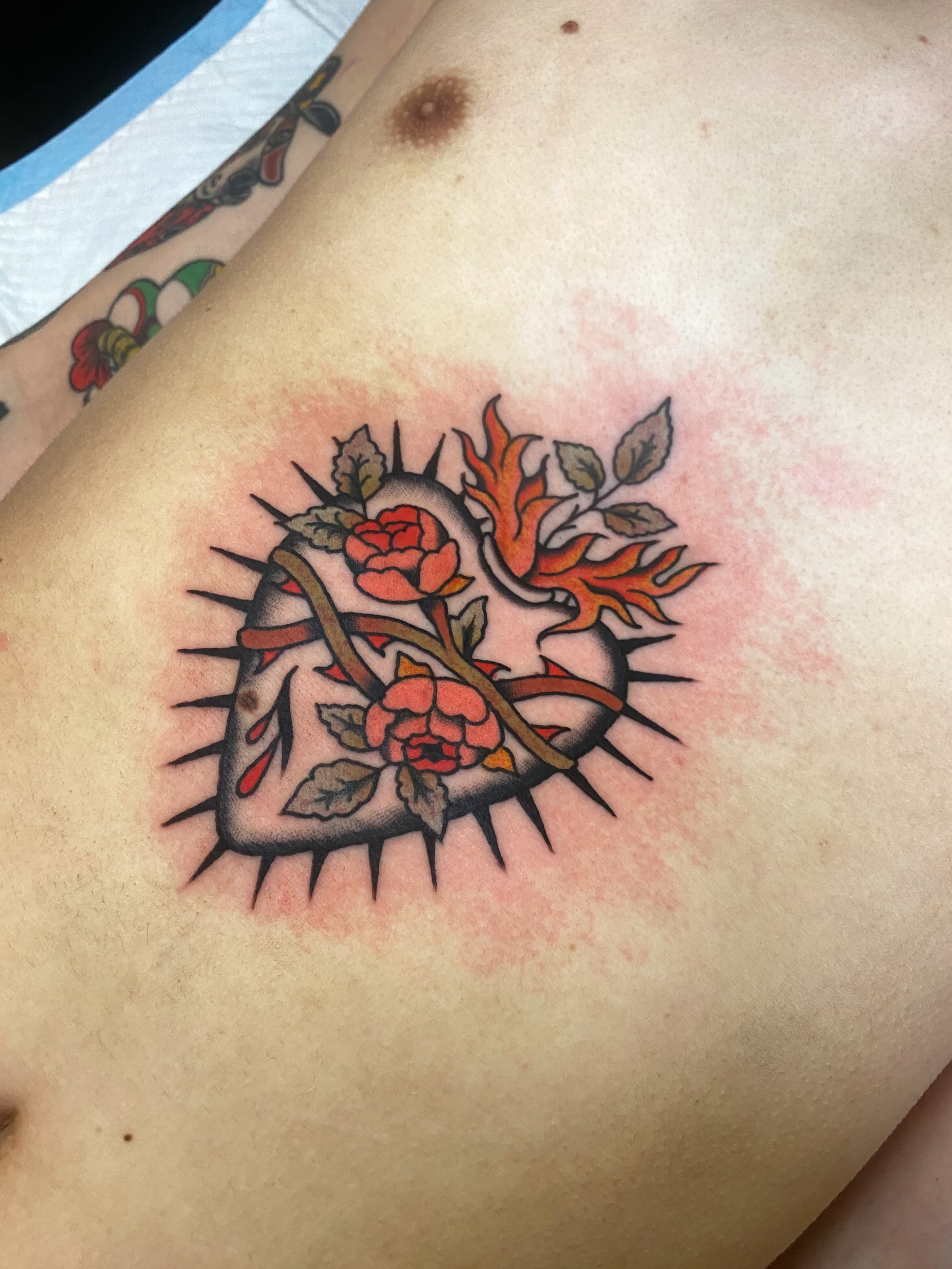 Heart with roses American traditional tattoo by Jaclin Grace Hastings