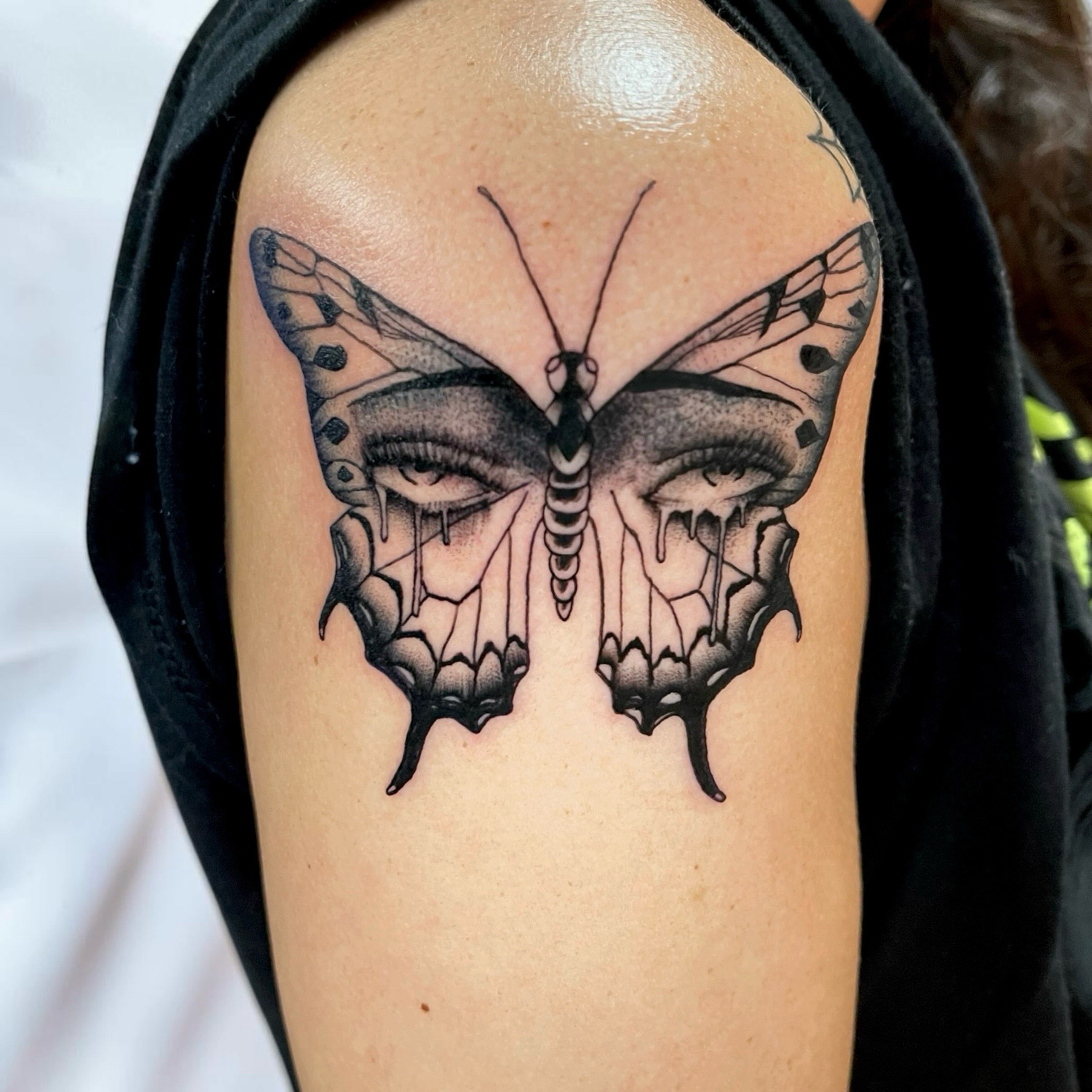 Butterfly realism tattoo on the shoulder by Brooke Kresco