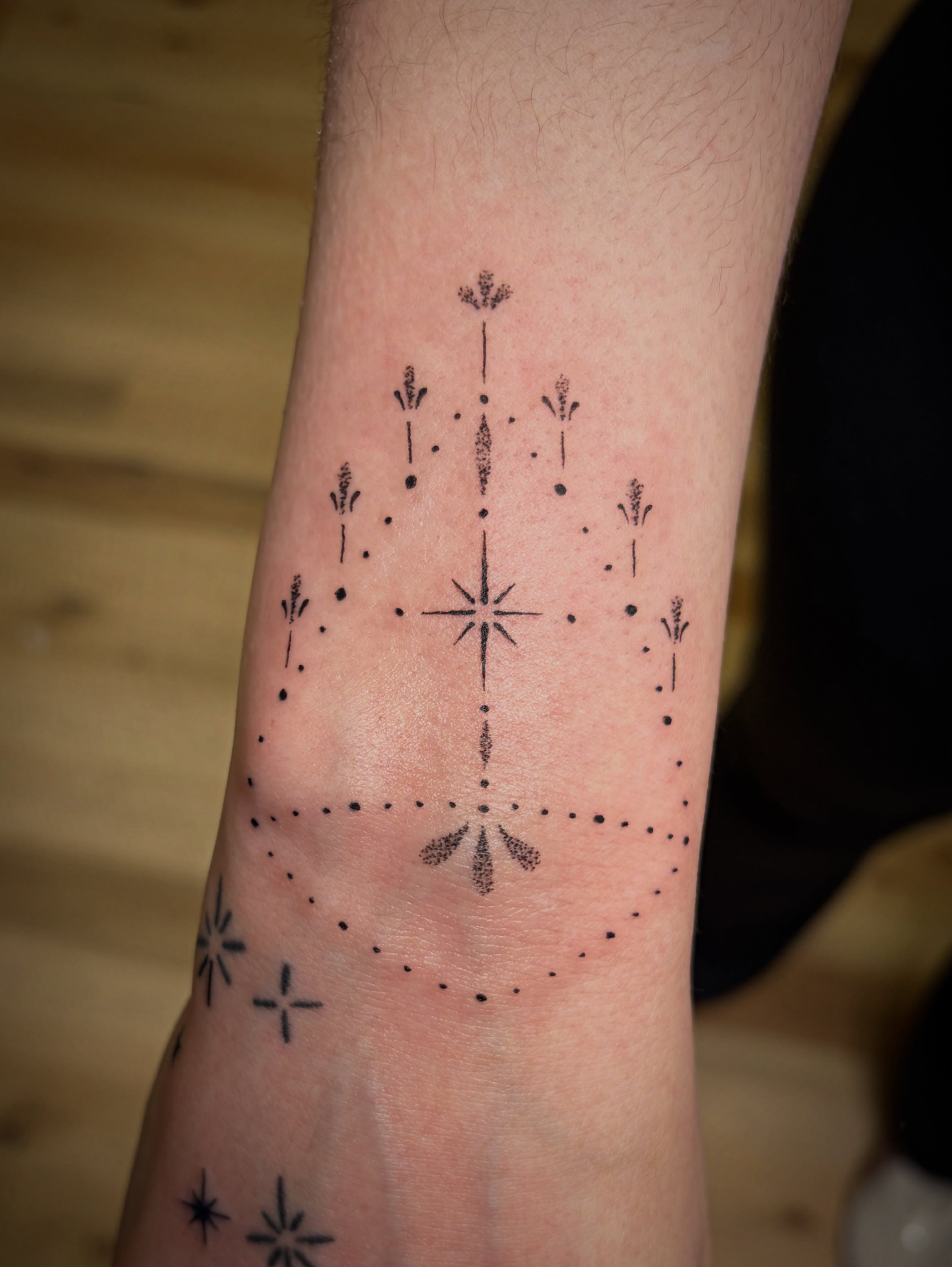 Constellation dotwork tattoo on the forearm by Francesca Siwa