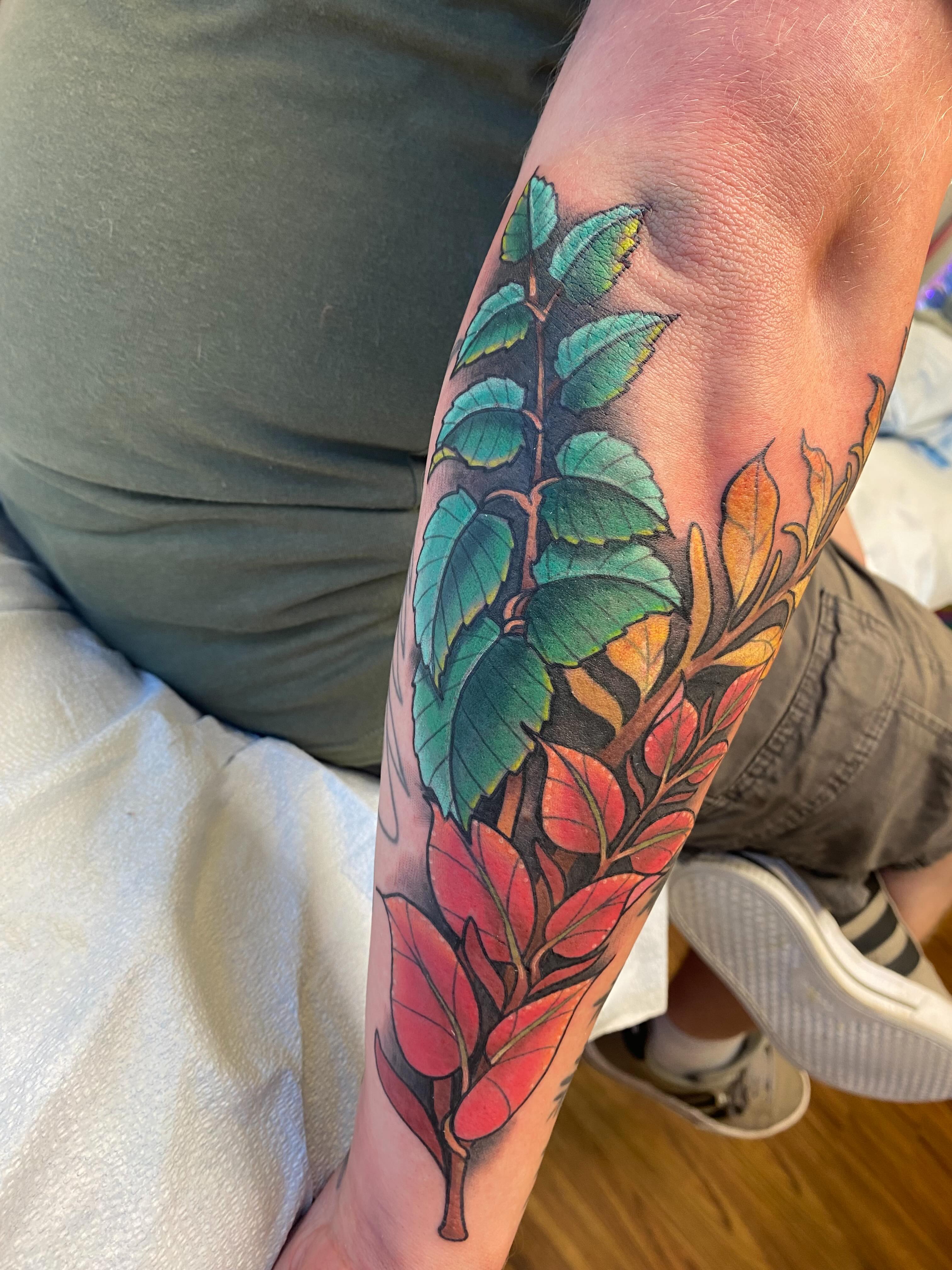 Fall leaves realism tattoo on the forearm by Kellsey Mull
