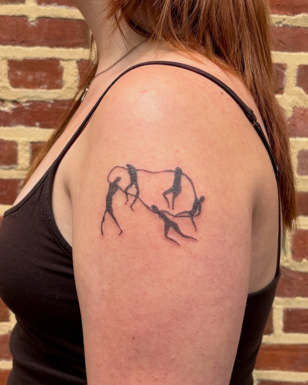 Ancient art minimalist tattoo on the shoulder by Jill