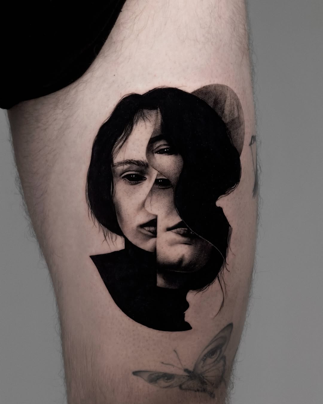 Abstract portrait realism tattoo on the forearm by Henko