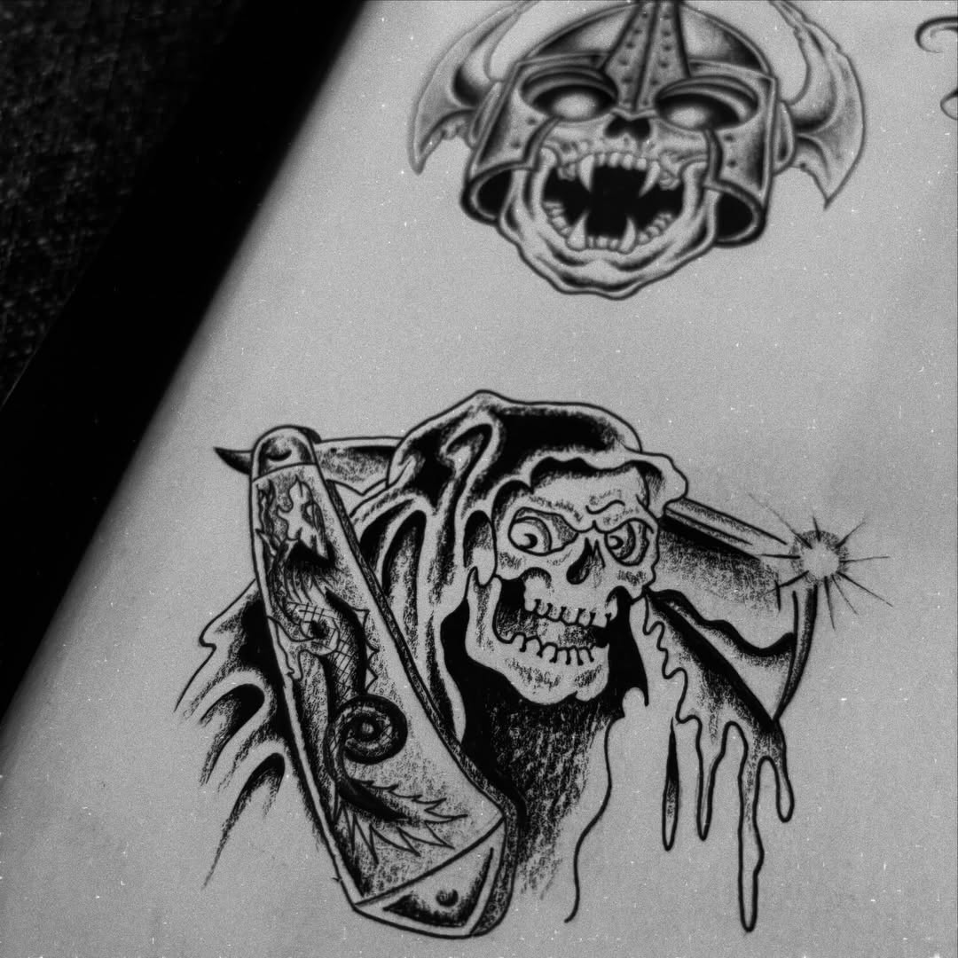 Skull with wings black and grey tattoo on the thigh by 18 and older High End Tattoo
