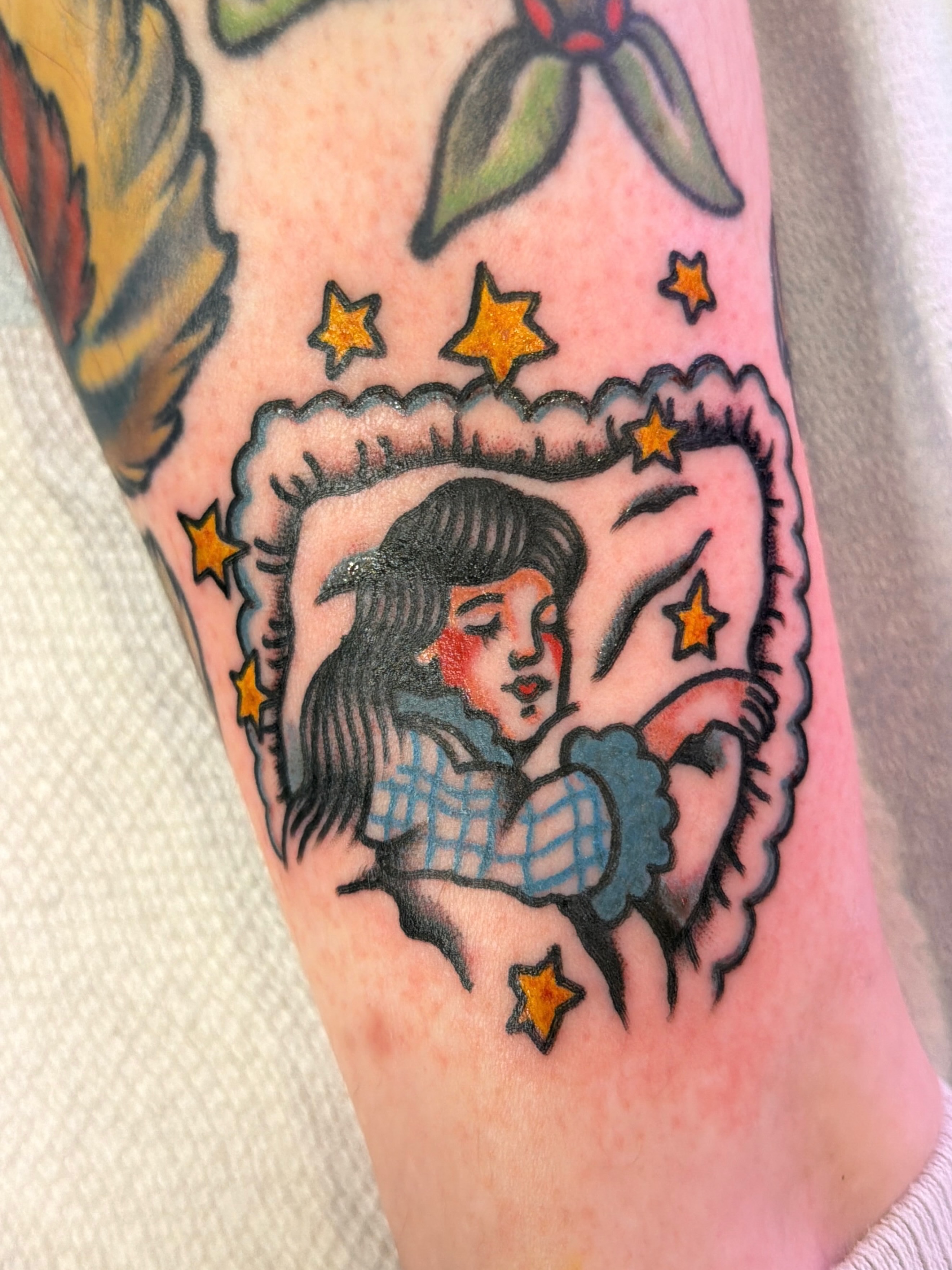 Sleeping girl American traditional tattoo on the forearm by Emma Fox Tattoo