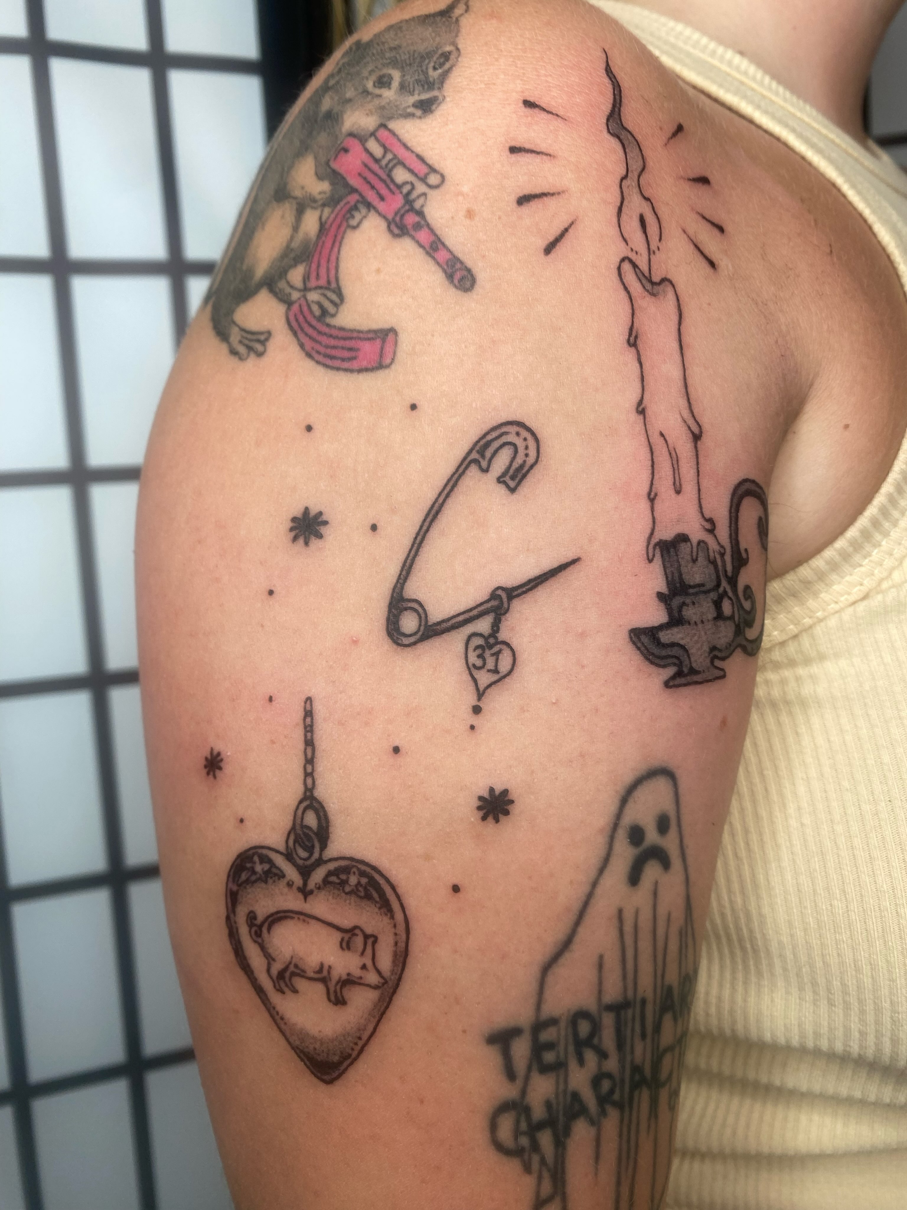 Tattooed phrases and symbols black and grey tattoo on the shoulder by sarah 🗝️