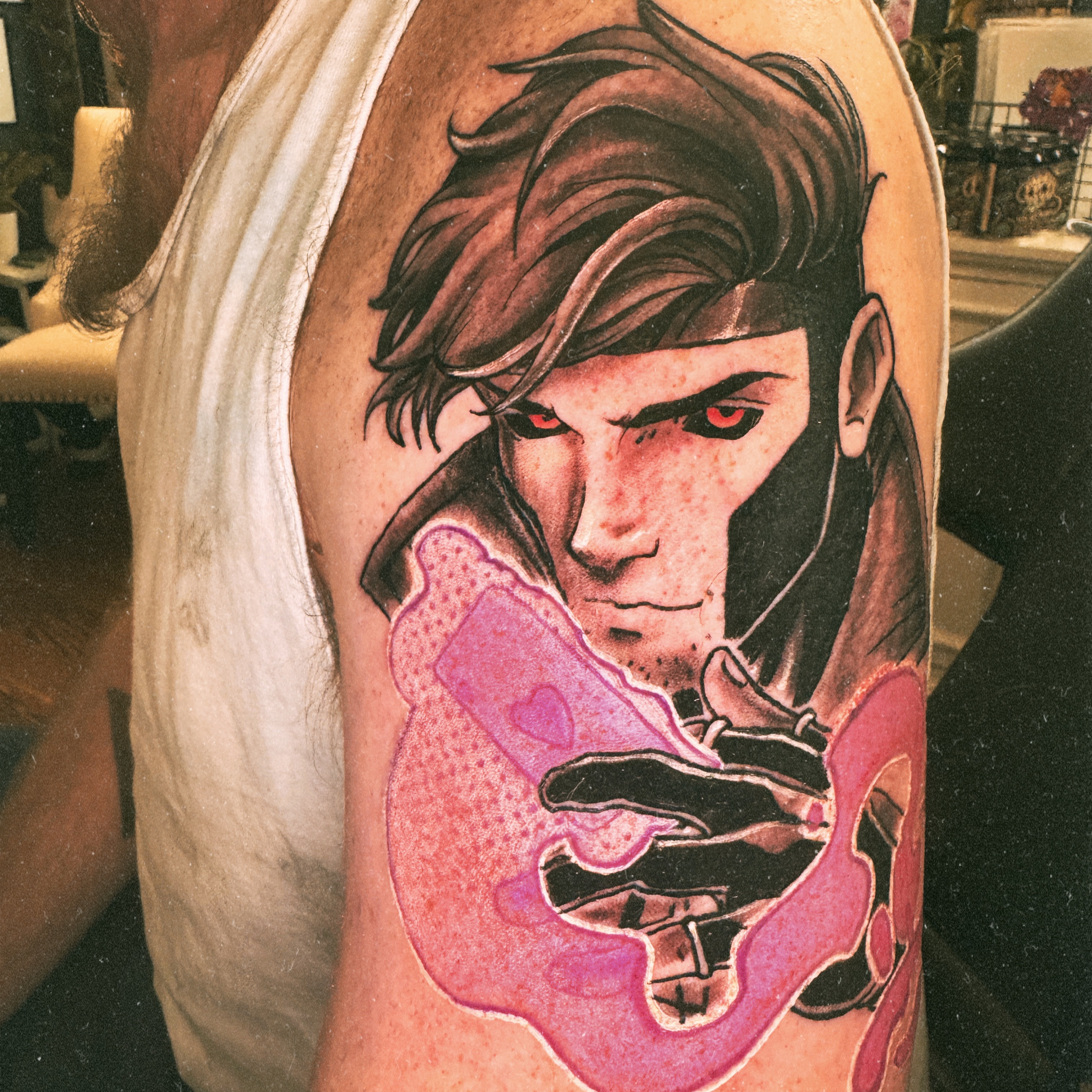 Man holding phone realism tattoo on the forearm by Eric Burns - NoVA Tattoo Artist