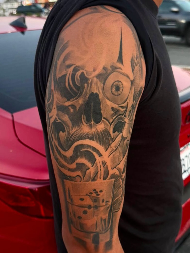 Skull realism tattoo on the forearm by San Diego Tattoo Artist