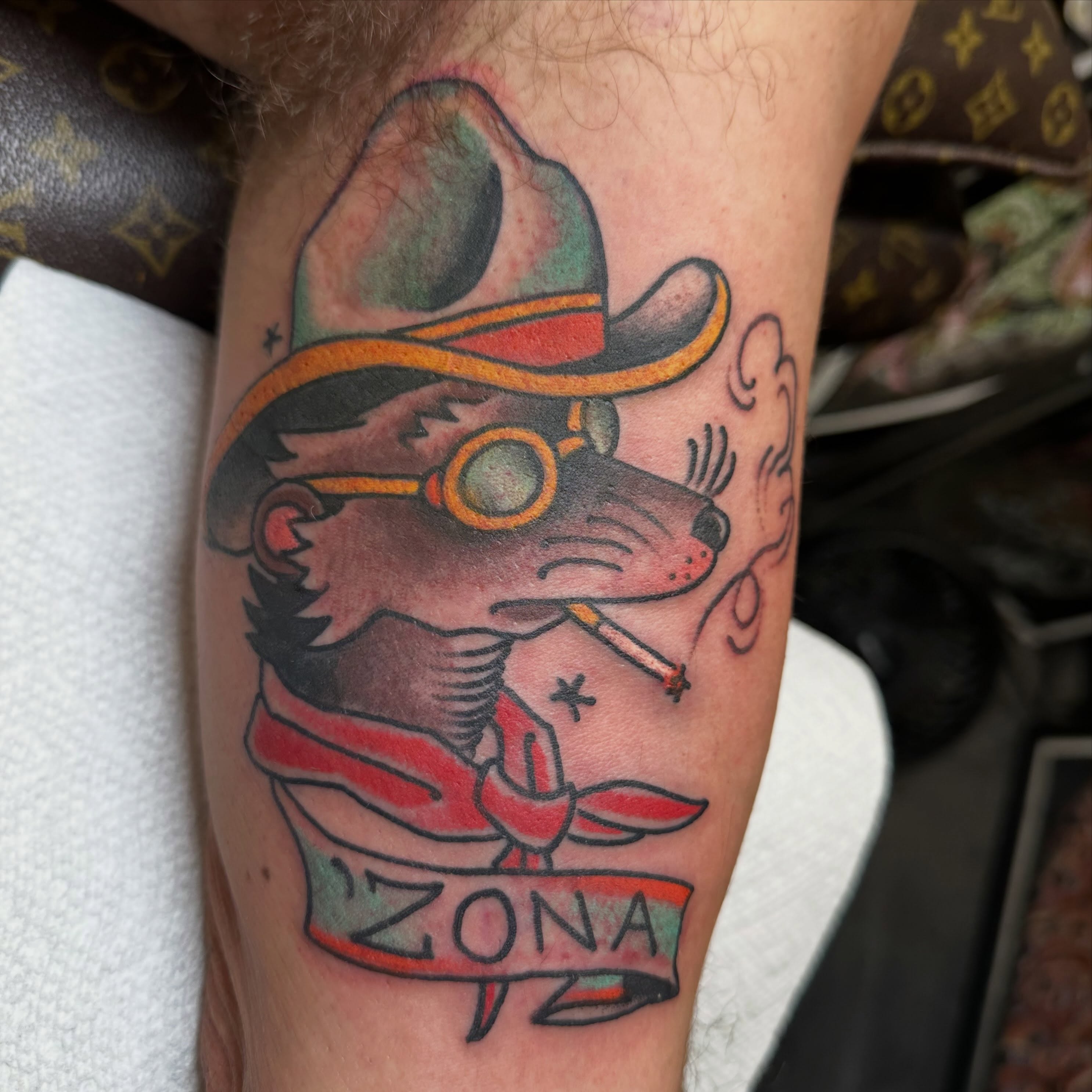 Fox wearing hat American traditional tattoo on the forearm by Joey Knuckles