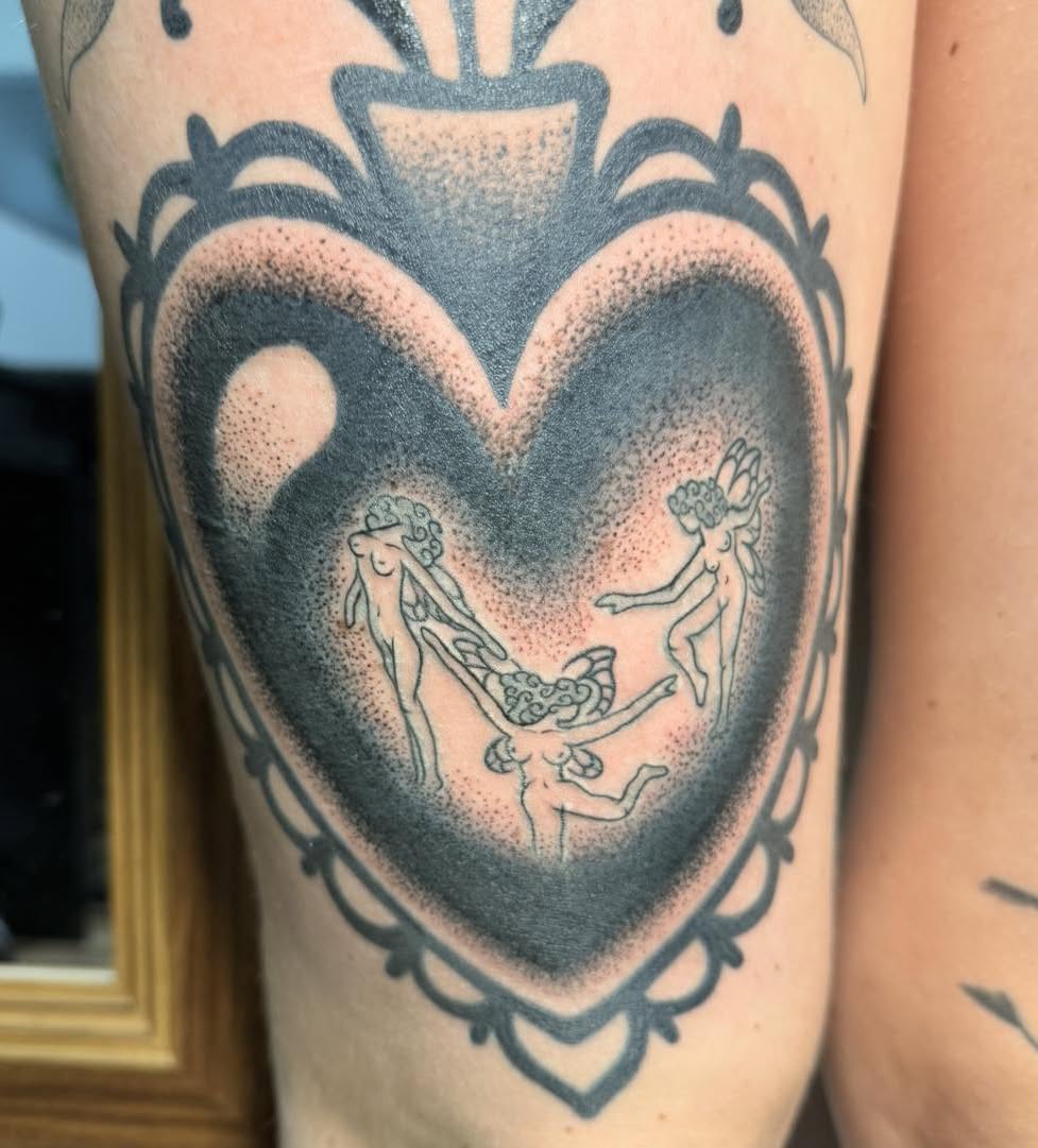 Heart with figures dotwork tattoo on the forearm by Destiny A